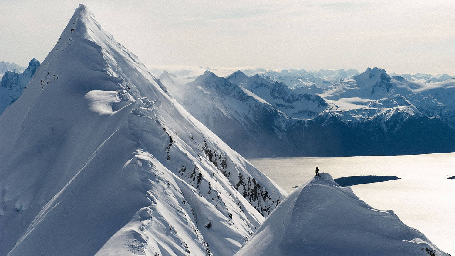 snow-covered mountain ridge, vast frozen lake, distant peaks, HD Desktop Wallpaper