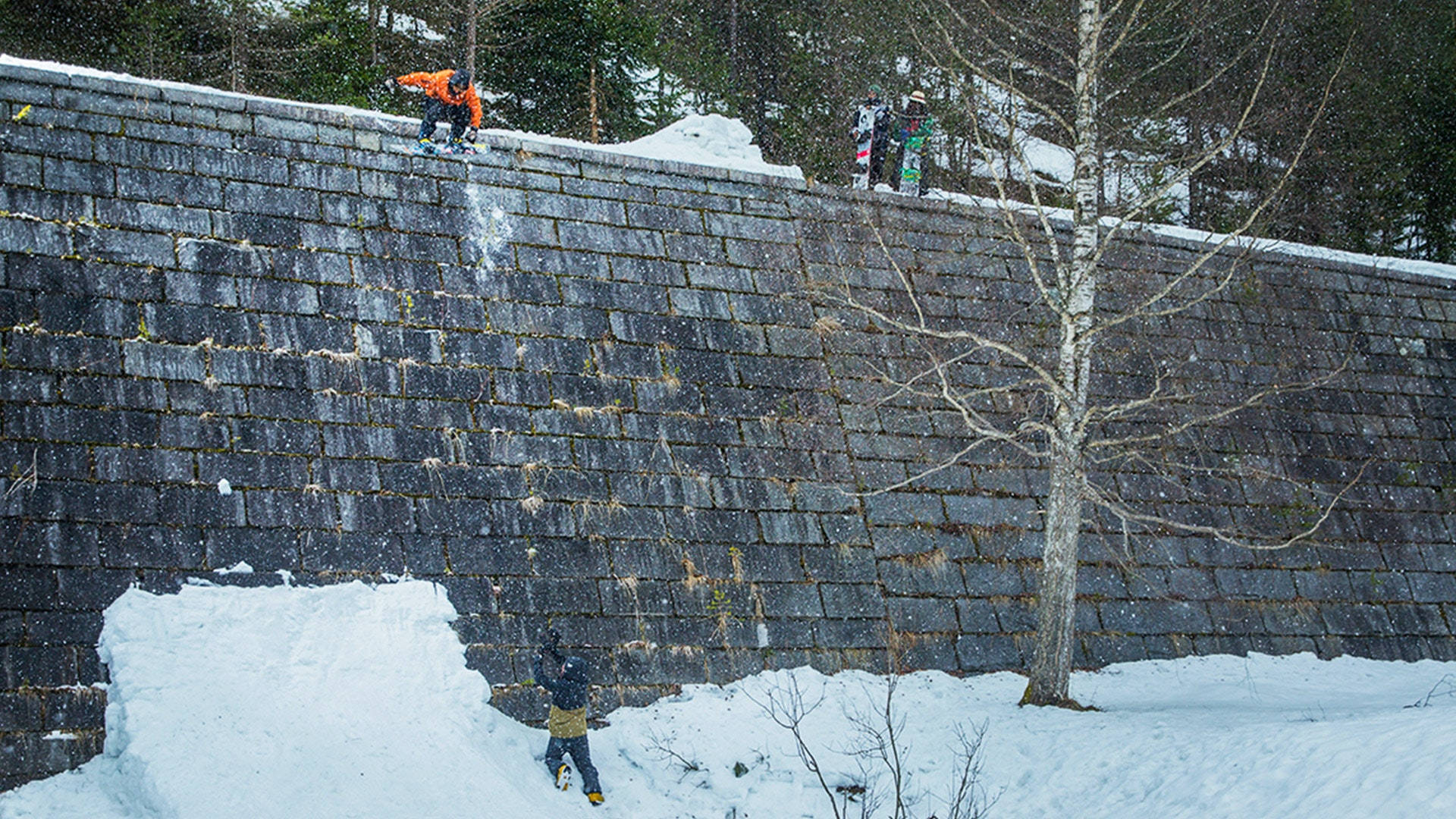 snowboarding, snow-covered stone wall, winter forest, Full HD Desktop Wallpaper