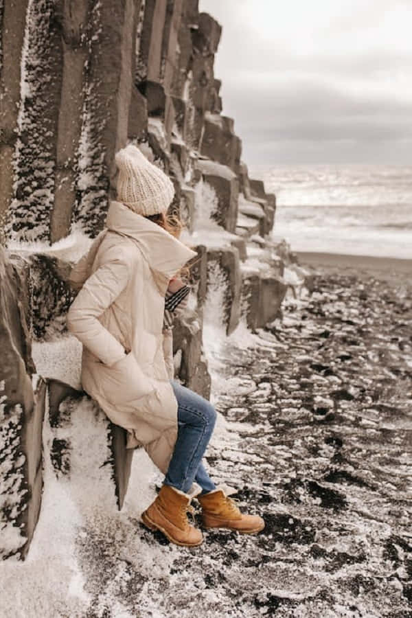 snowshoes, cream coat, knit hat, SD Phone Wallpaper
