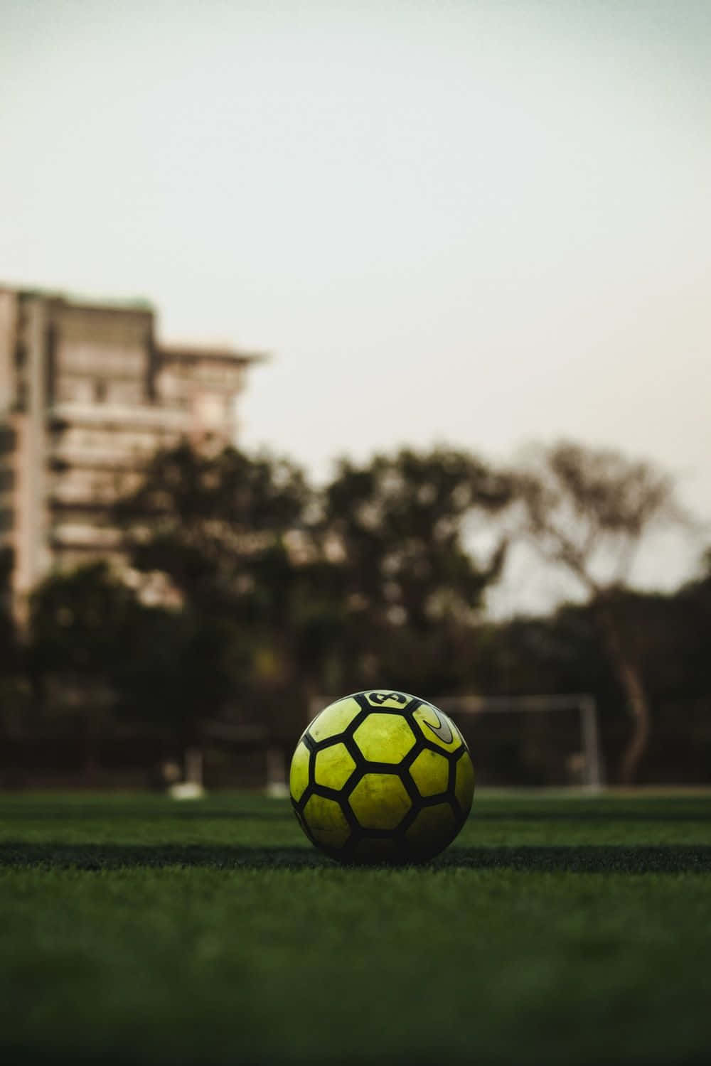 soccer ball, bright yellow, vibrant green grass, HD Phone Wallpaper