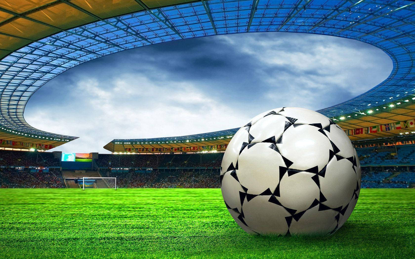 black and white soccer ball, vibrant green grass, massive modern stadium, HD Desktop Wallpaper