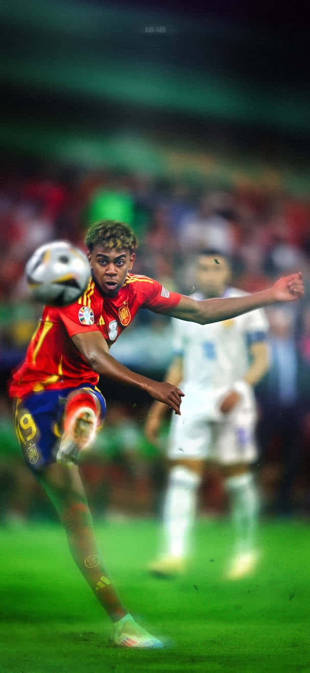 soccer player, red and yellow jersey, vibrant green pitch, HD Phone Wallpaper
