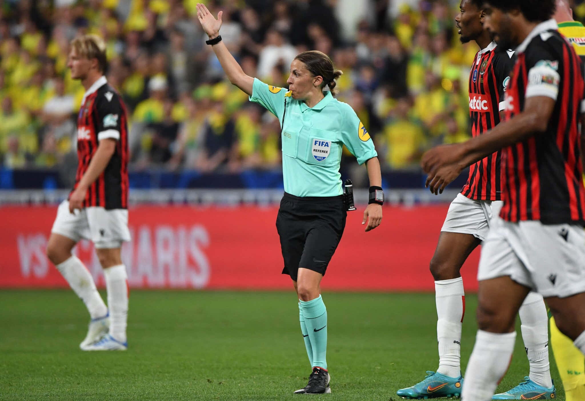 female soccer referee, light blue uniform, red and black striped jerseys, Full HD Desktop Wallpaper