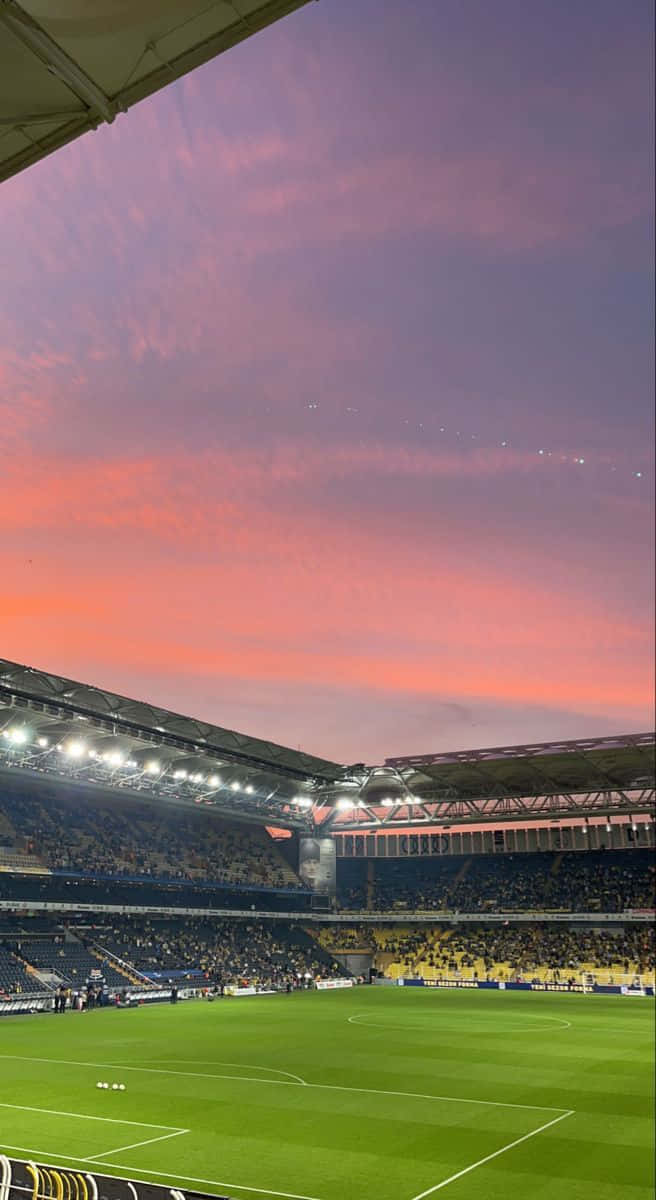 sunset, soccer stadium, pink and purple hues, SD Phone Wallpaper