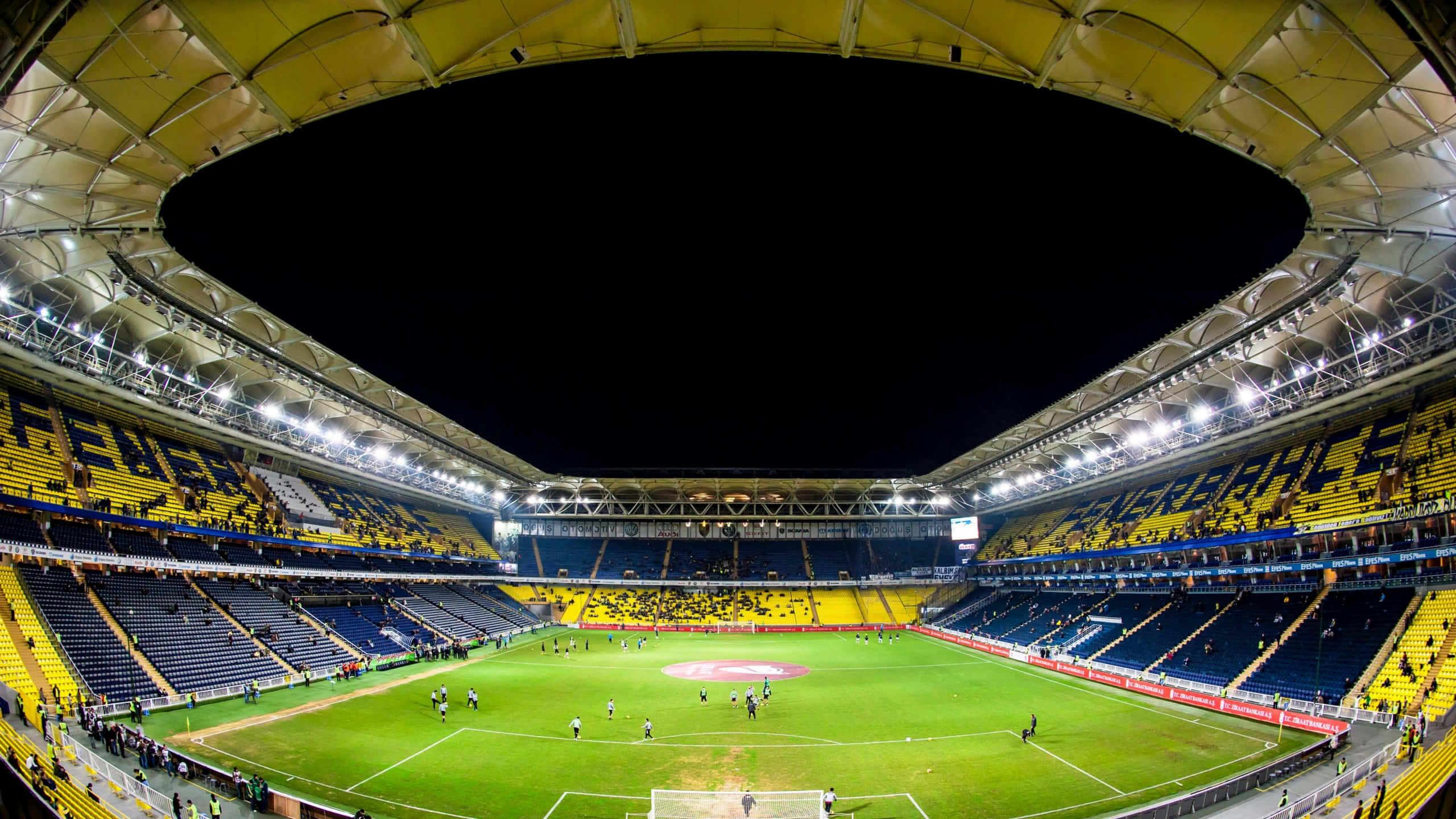 Soccer Stadium, yellow and blue seats, brightly lit soccer stadium, 2K Desktop Wallpaper