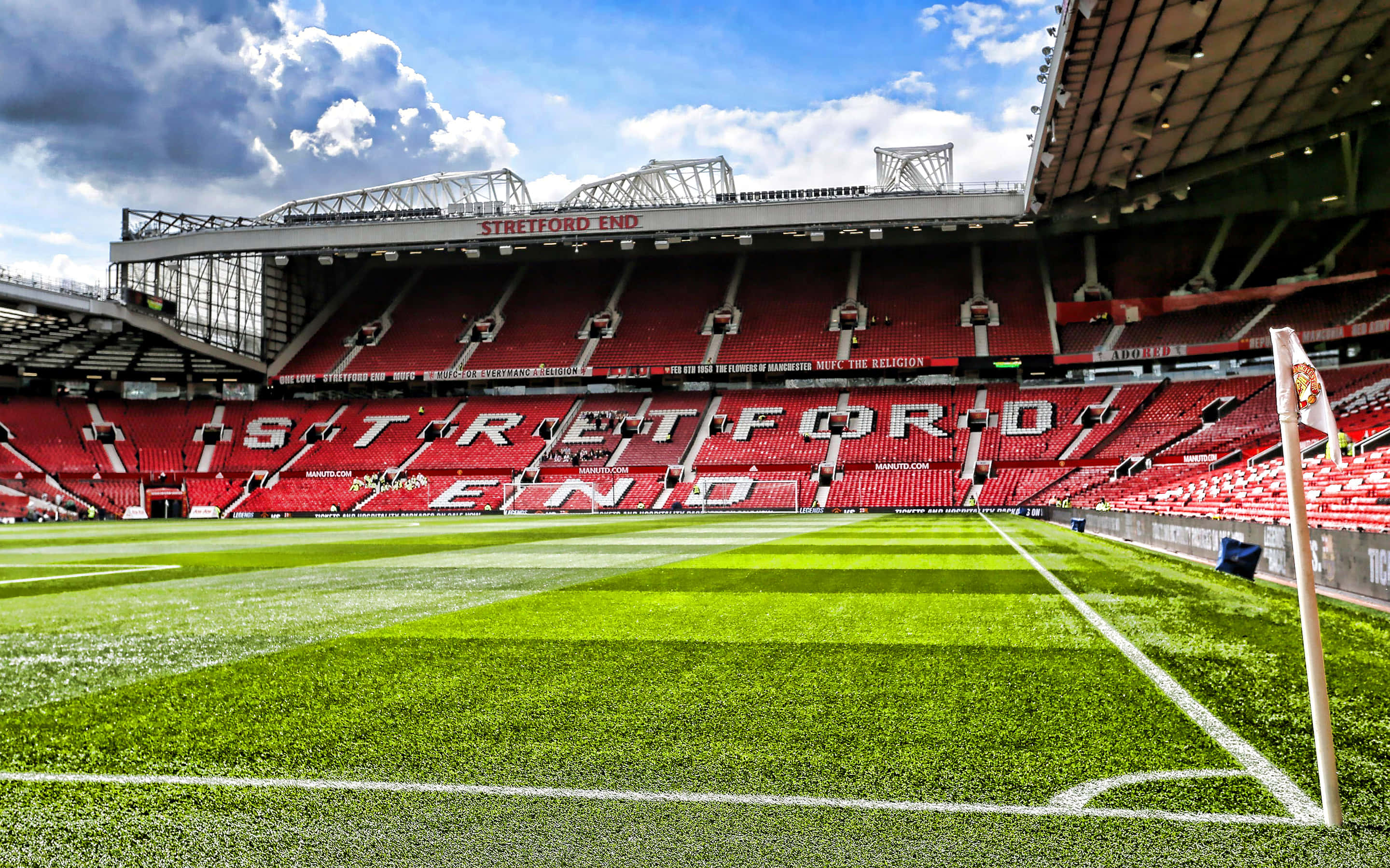 Soccer Stadium, green football pitch, red Stretford End stand, 2K Desktop Wallpaper