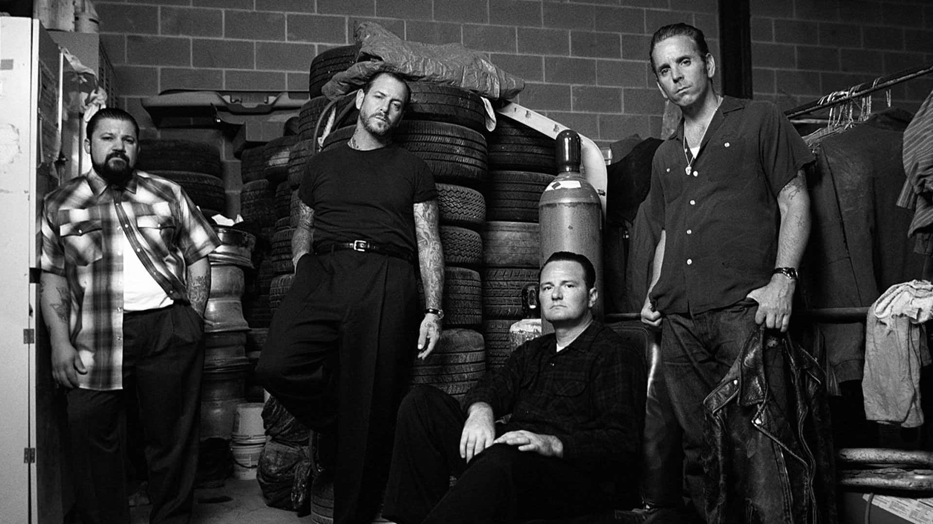 Social Distortion, garage, stacked tires, Full HD Desktop Wallpaper