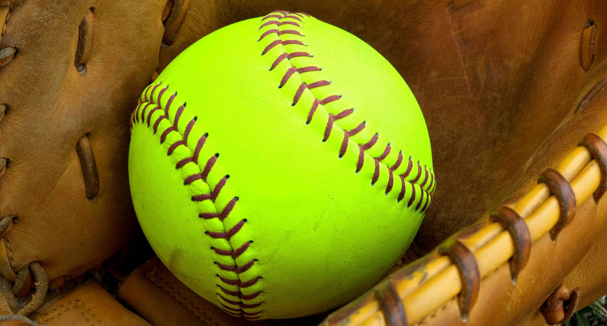 neon yellow softball, red stitching, well-worn brown leather glove, Full HD Desktop Wallpaper