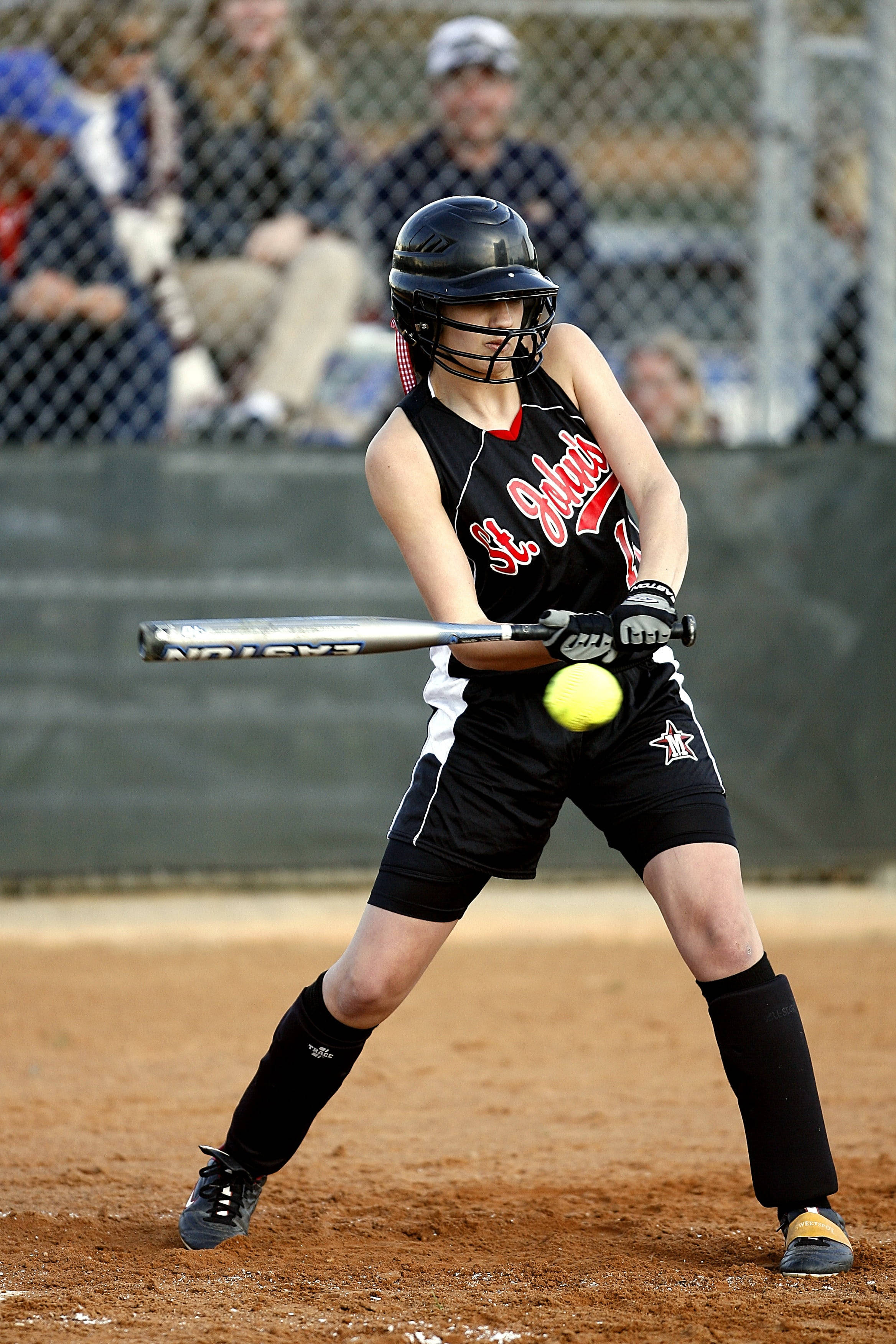softball player, all black uniform, bright yellow ball, 2K Phone Wallpaper