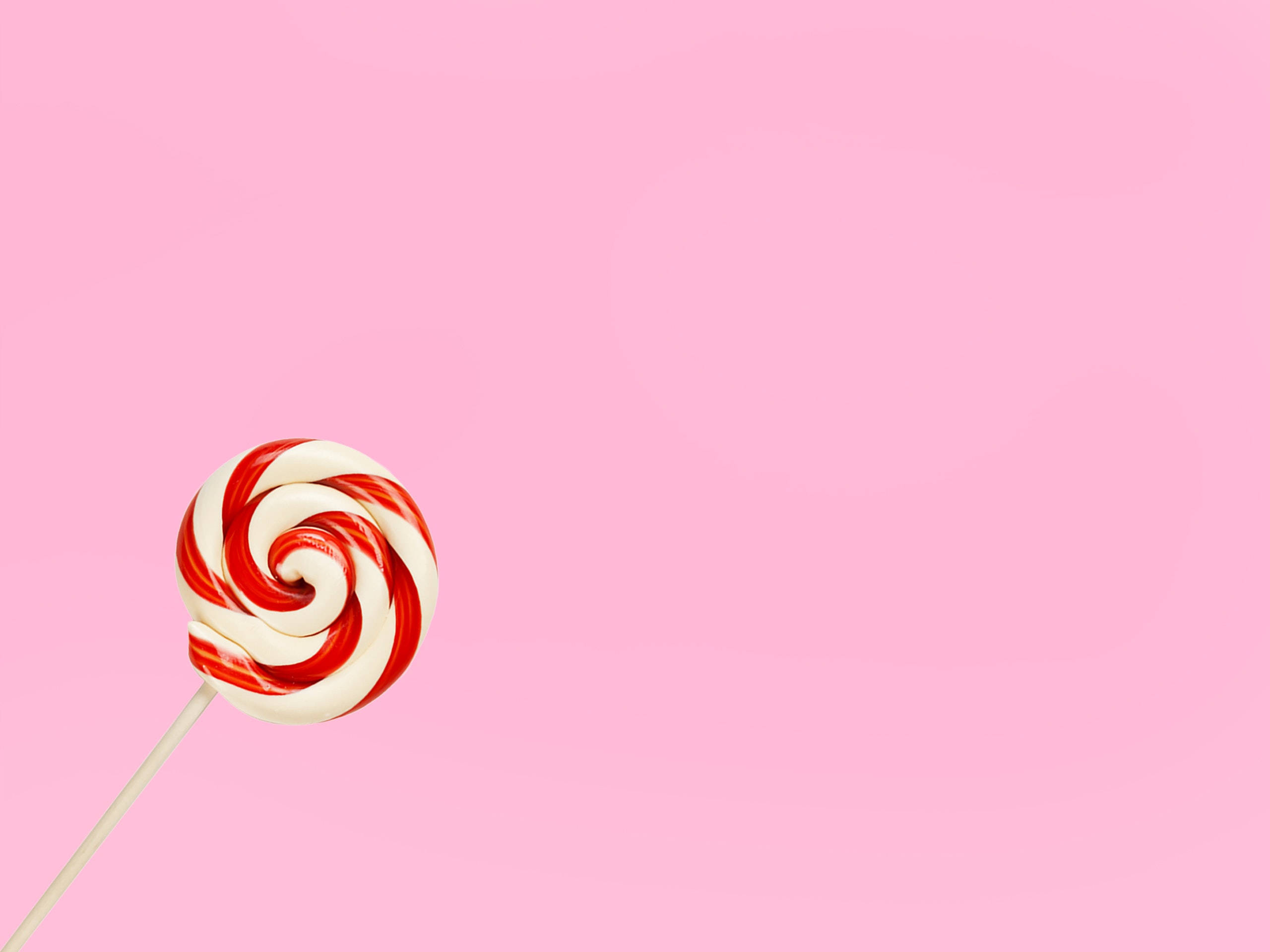 minimal light pink lollipop, sweet minimalism, red and white swirled lollipop, 2K Desktop Wallpaper