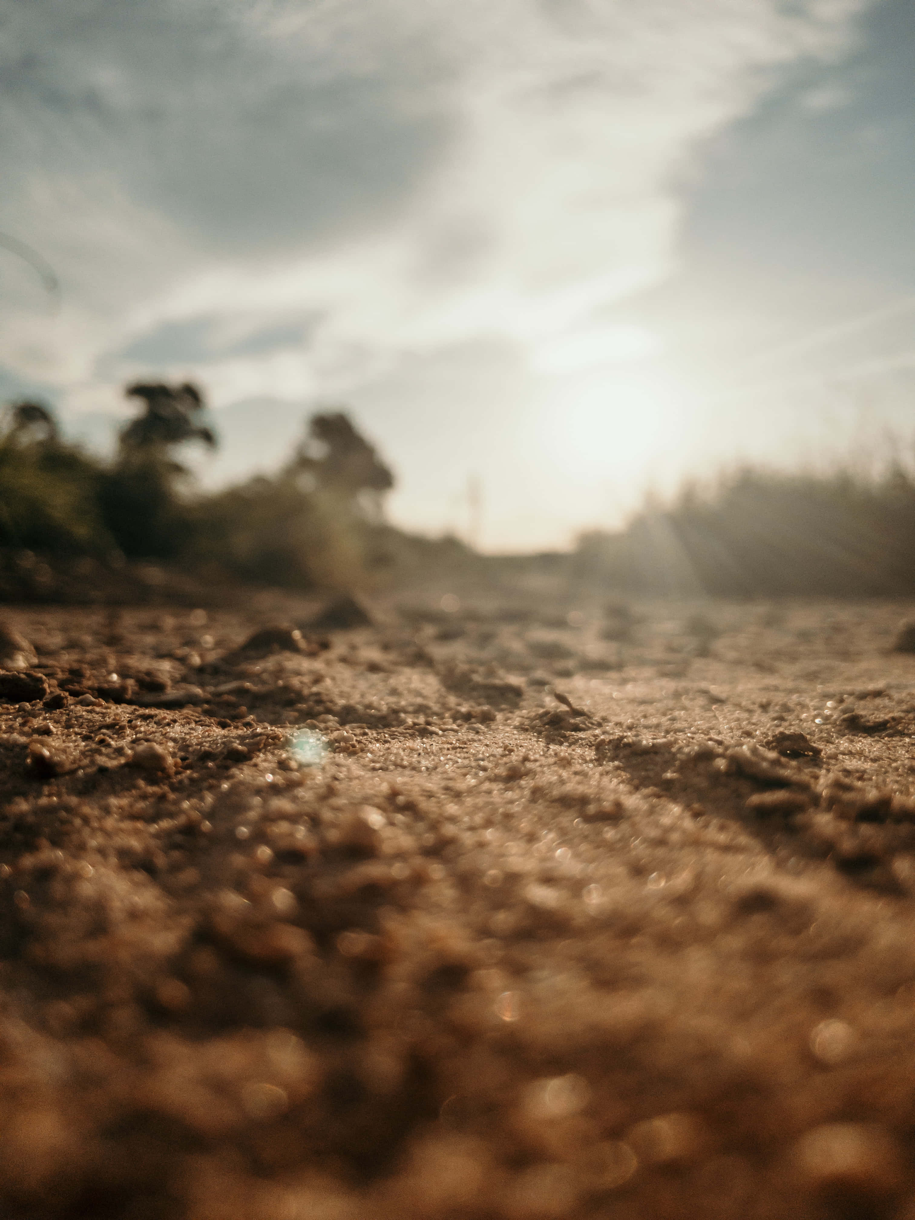 natural brown earth soil, sunbeams, clouds, 4K Phone Wallpaper