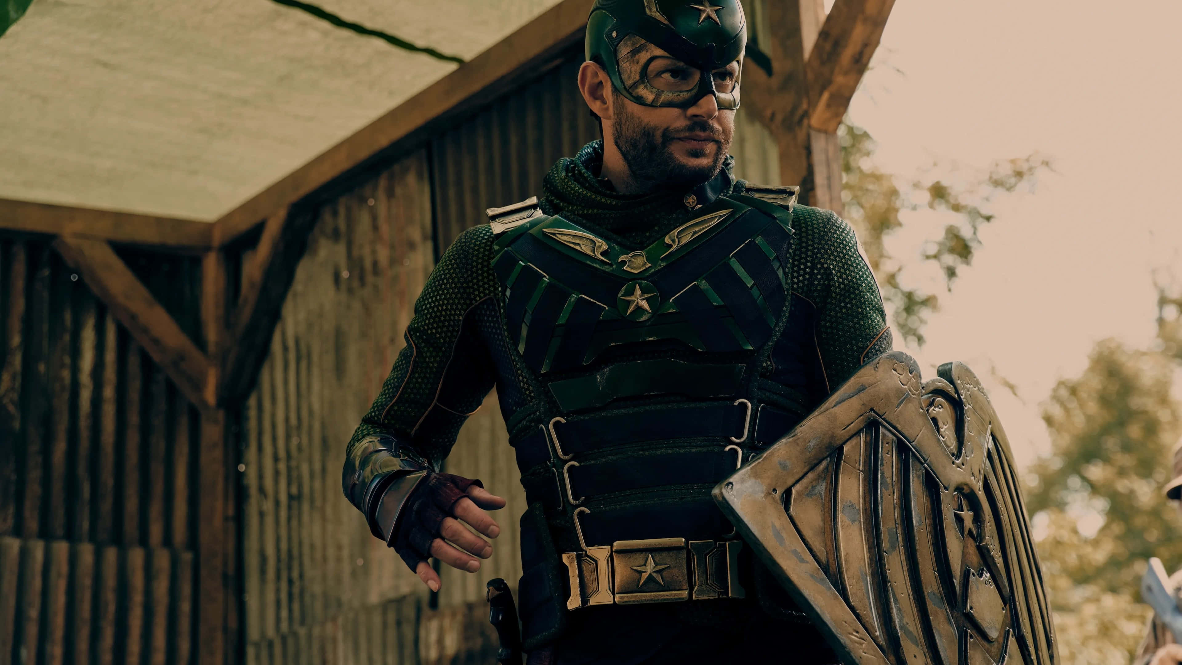 Soldier Boy, green star-emblazoned superhero suit, weathered shield, 4K Desktop Wallpaper