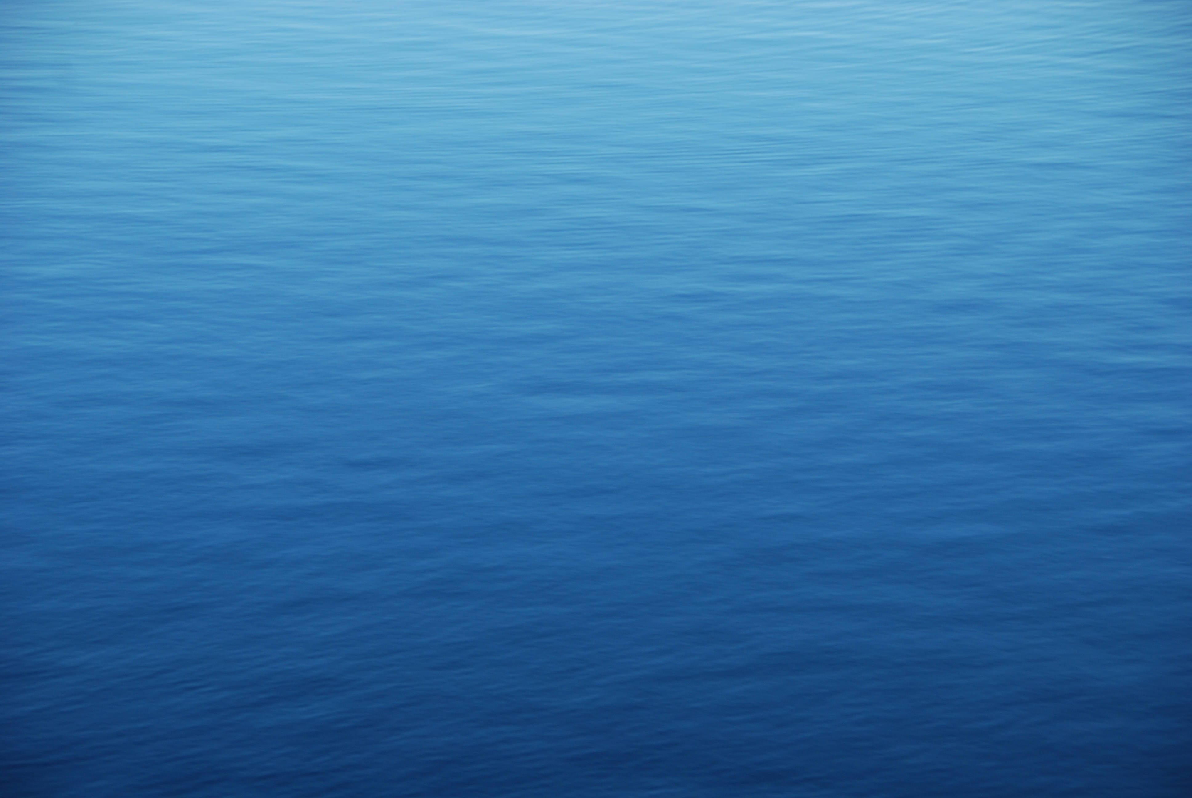 plain blue ocean water, calm blue ocean water, serene gradient blue ocean surface, 4K Desktop Wallpaper