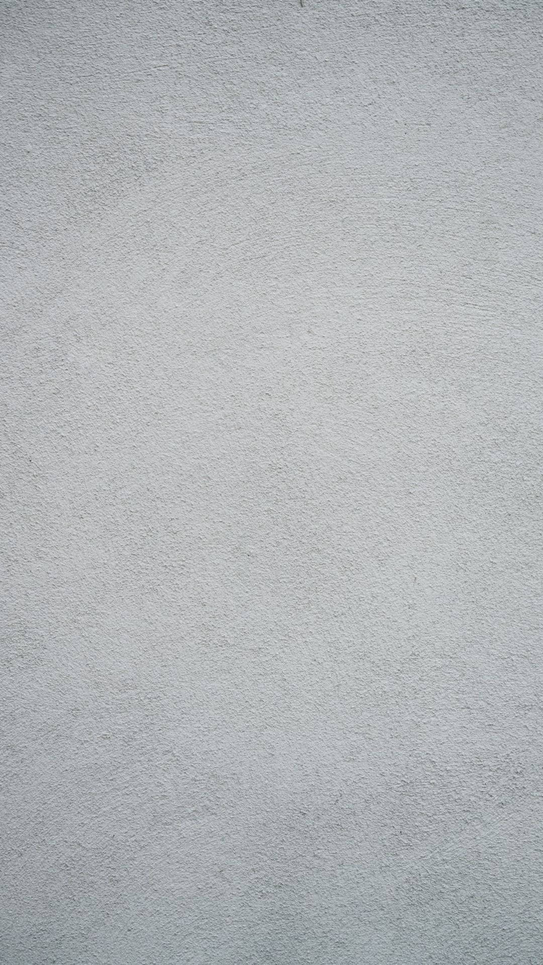 solid grey wall, subtle speckles, smooth light gray textured wall surface, Full HD Phone Wallpaper