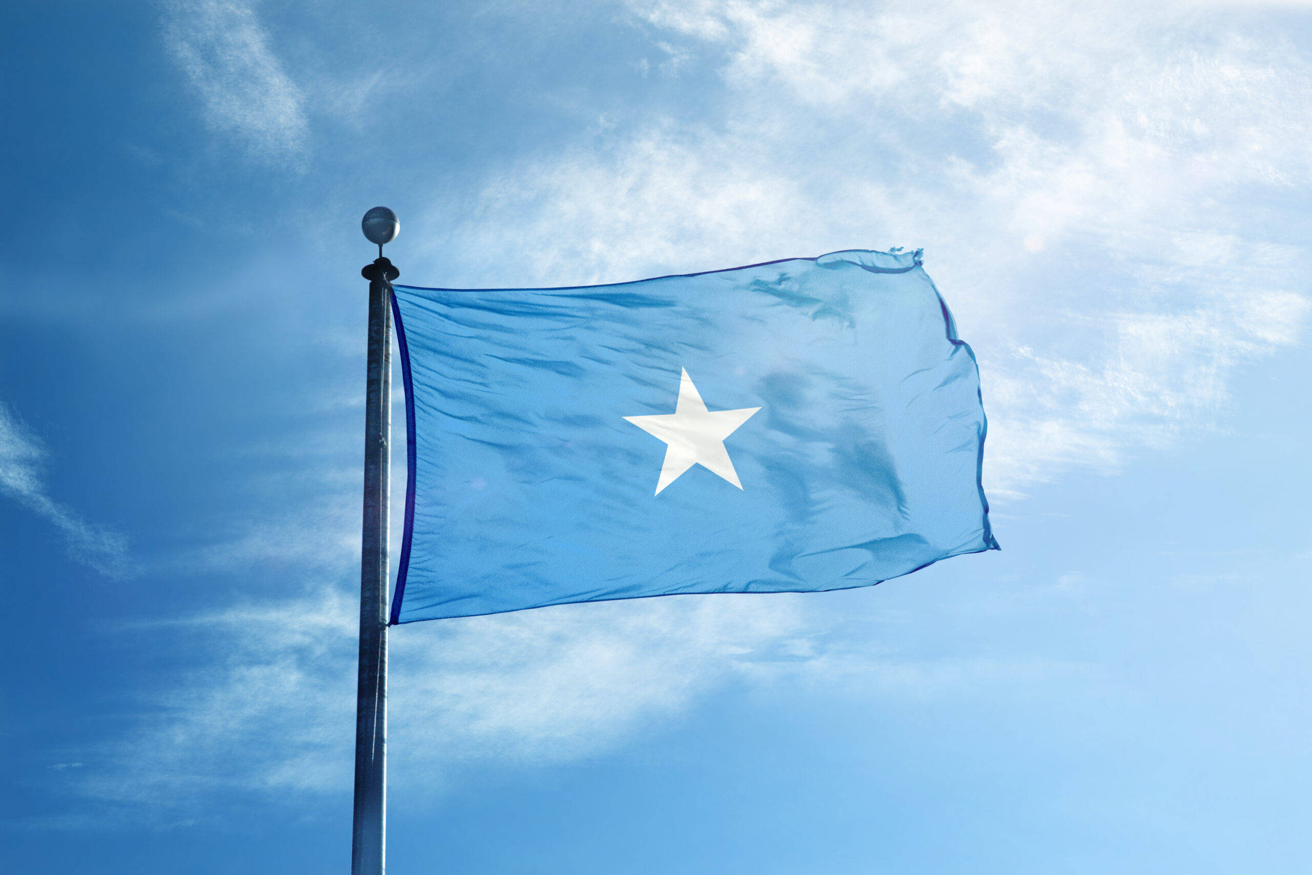 Somalia flag, white star, bright blue sky, 2K Desktop Wallpaper