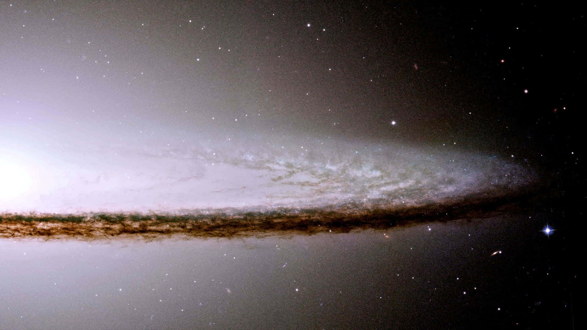 Sombrero Galaxy, dusty brown band, bright white core, Full HD Desktop Wallpaper