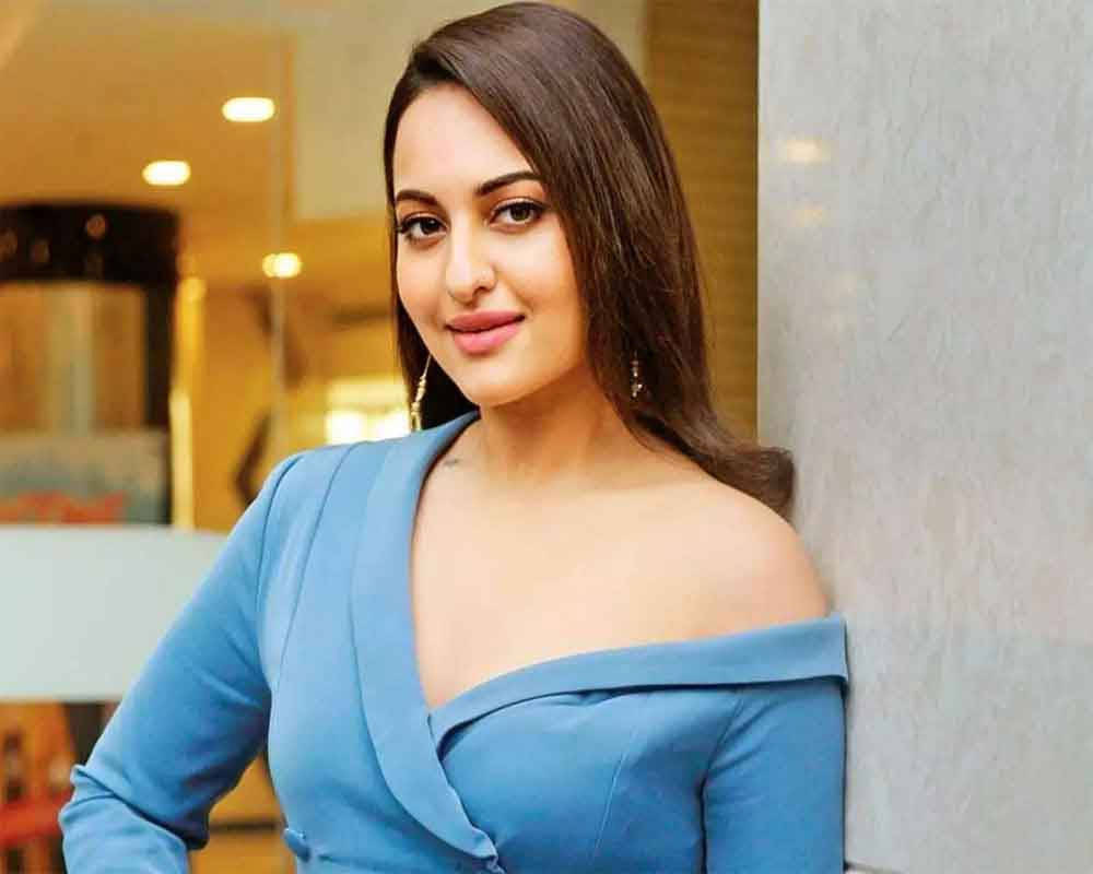 Sonakshi Sinha, blue off-shoulder dress, warm indoor lighting, SD Desktop Wallpaper