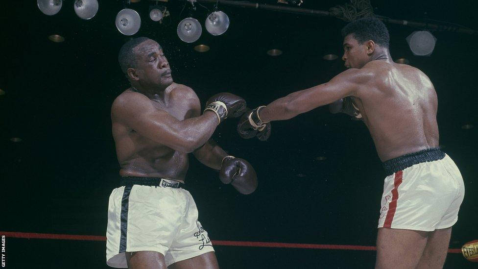 Sonny Liston, rain-slicked ring, bright overhead lights, SD Desktop Wallpaper