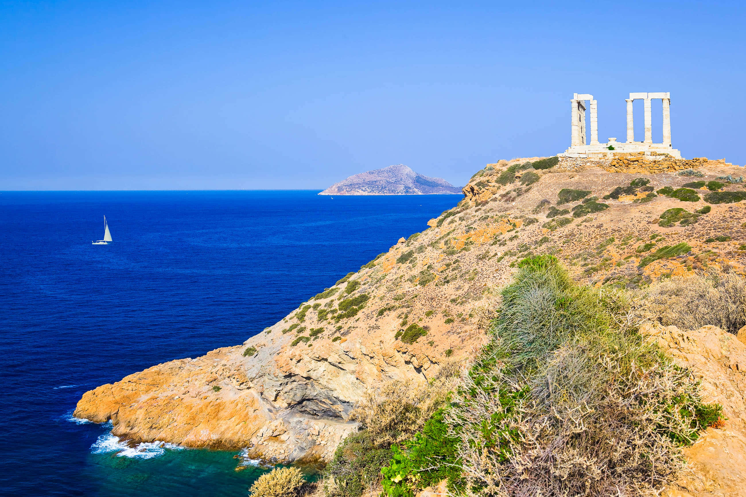 Sounion, ancient temple ruins, sunbaked cliff, 2K Desktop Wallpaper