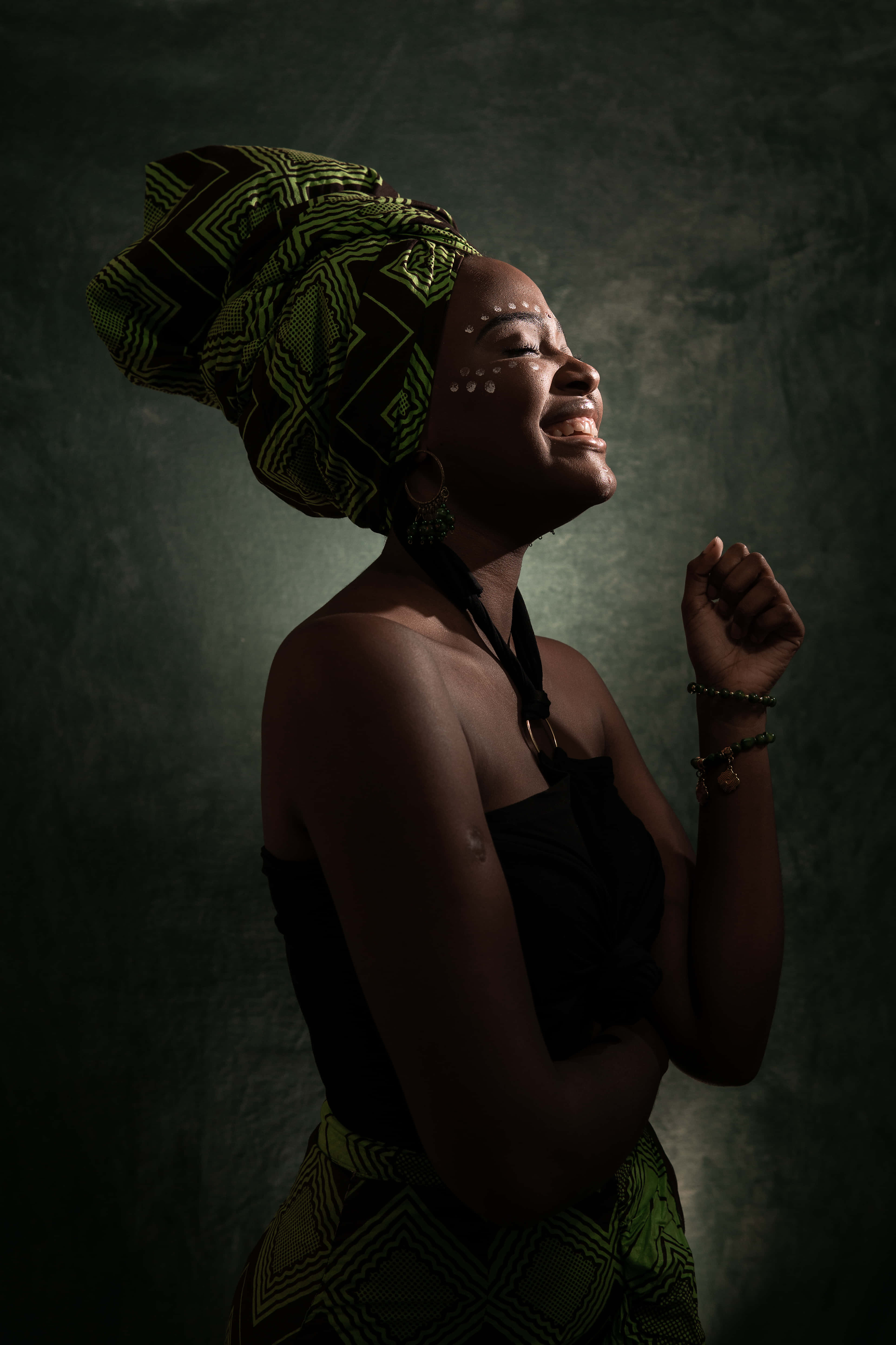 South African Woman, green and black patterned headwrap, serenely, 5K Phone Wallpaper