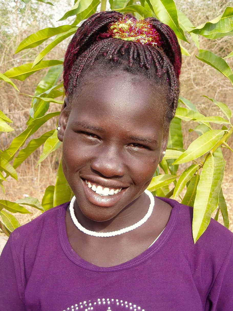 young South African woman, natural dark skin, braided hair, SD Phone Wallpaper