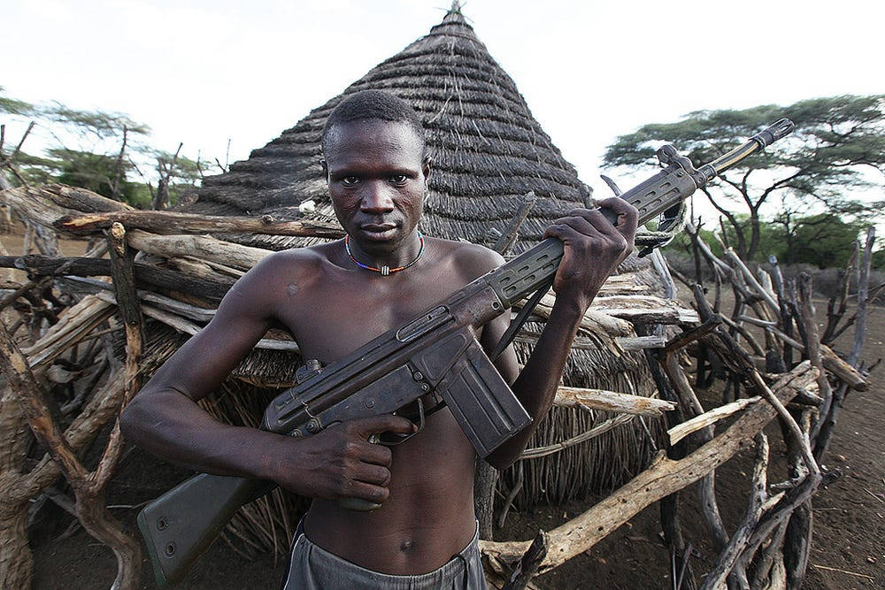 South Sudan, assault rifle, thatched hut, SD Desktop Wallpaper