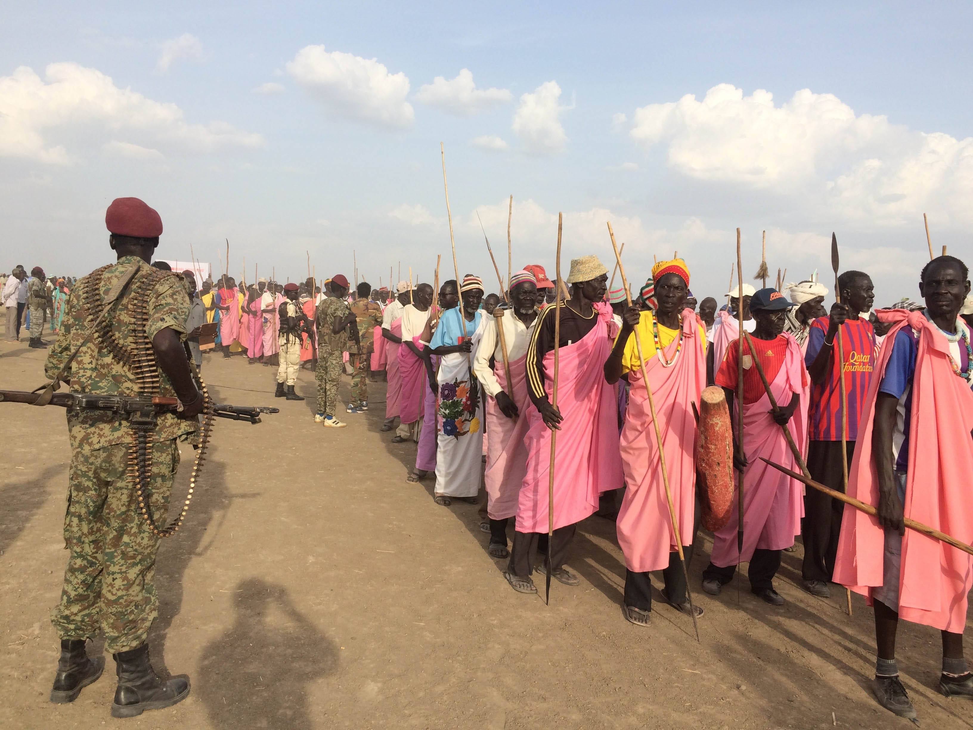 South Sudan, vibrant pink clothing, traditional headwear, 2K Desktop Wallpaper