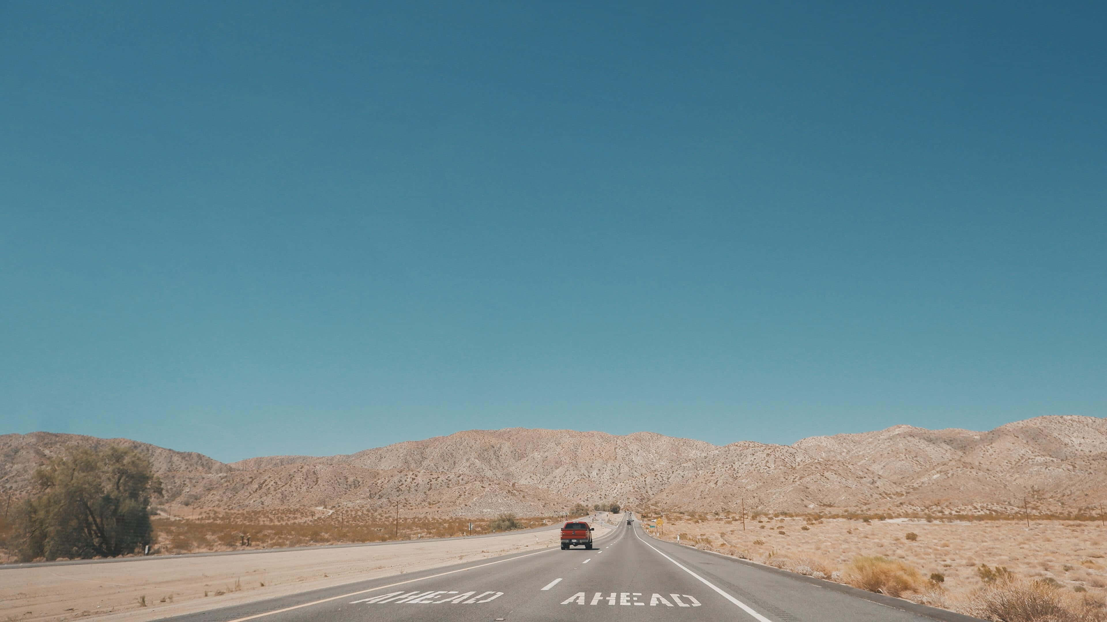Southern California, red car, desert highway, 4K Desktop Wallpaper