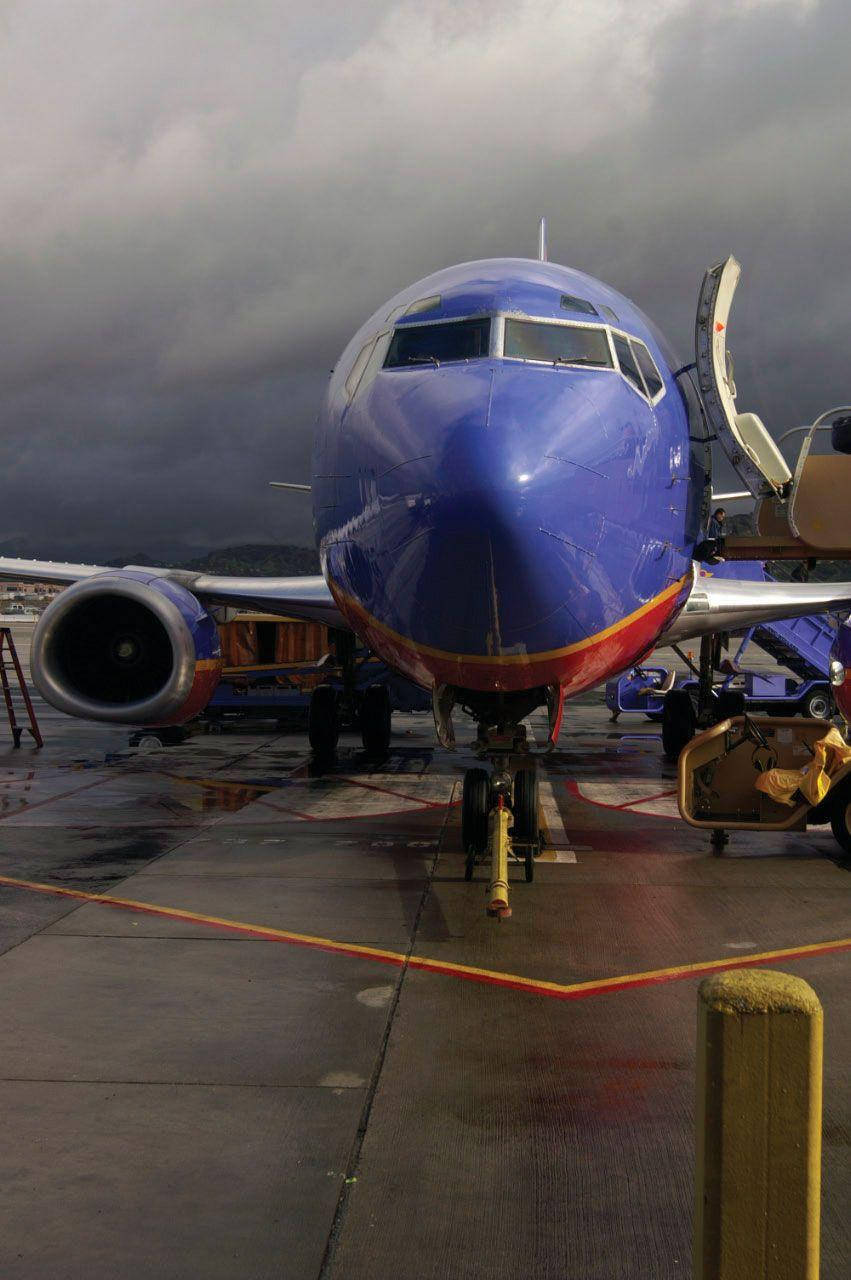 Southwest Airlines, jet, wet tarmac, HD Phone Wallpaper