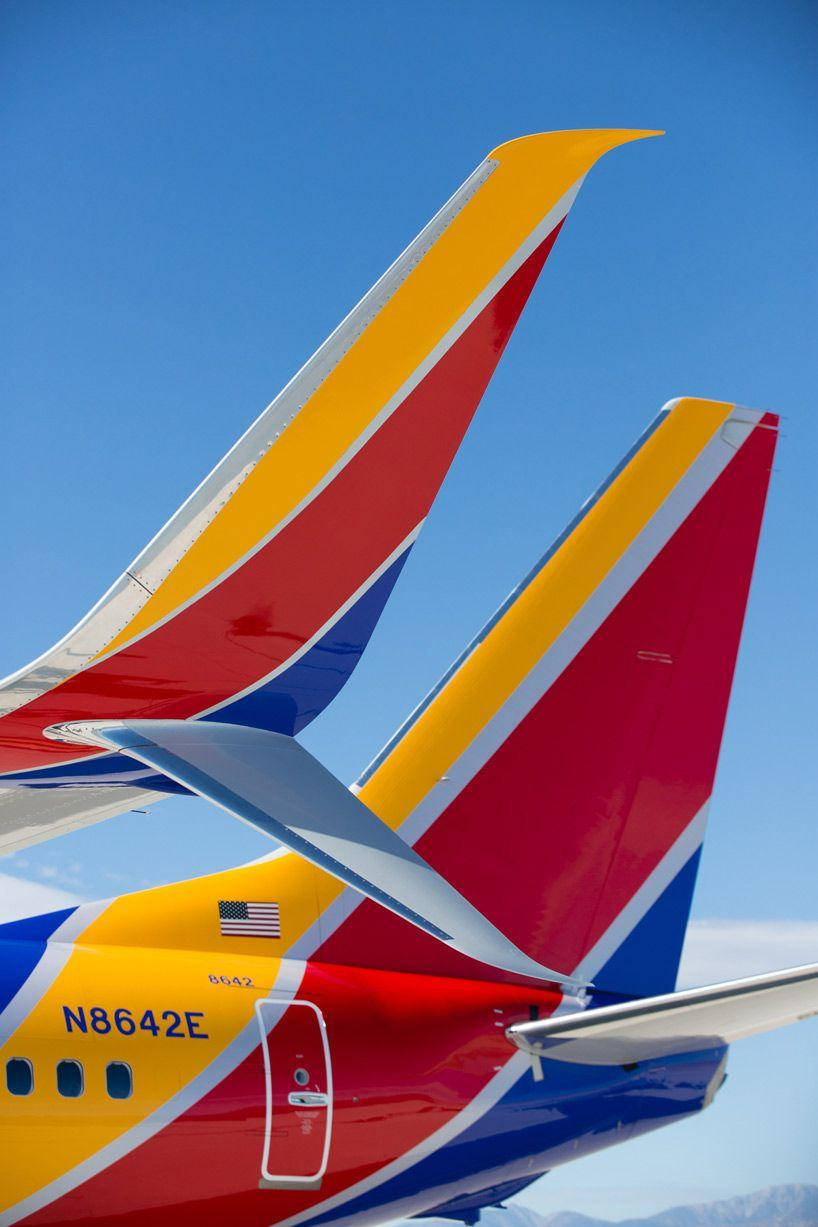 Southwest Airlines, colorful plane, red yellow and blue tails, SD Phone Wallpaper