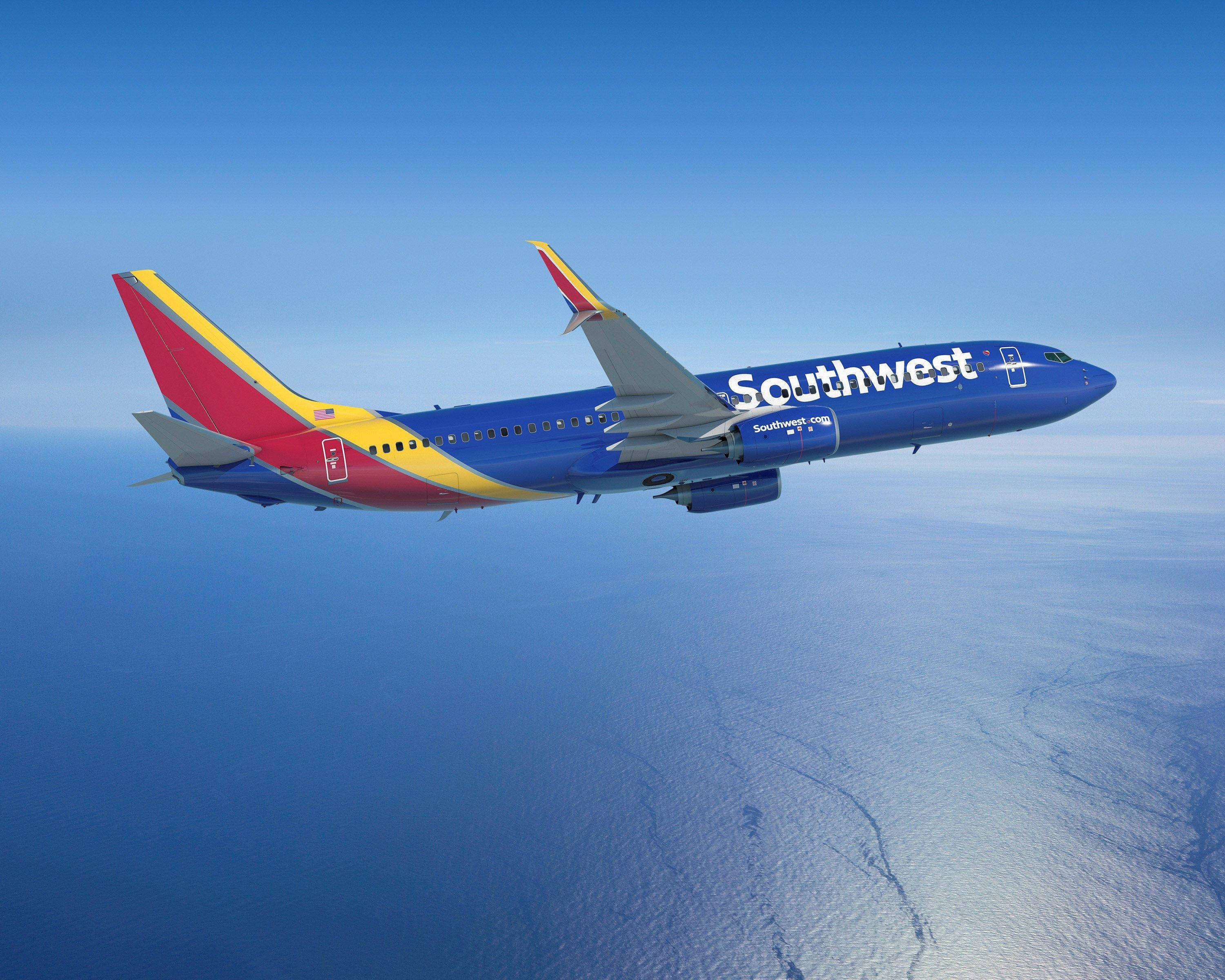 Southwest Airlines, airplane, ocean, 2K Desktop Wallpaper