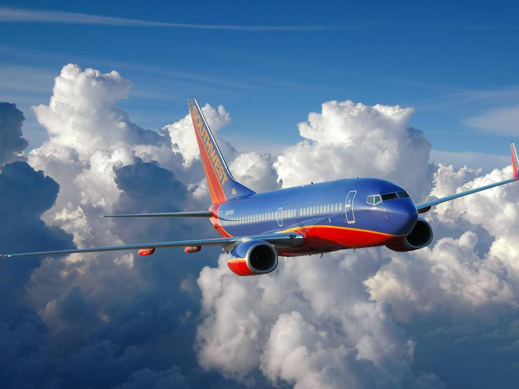 Southwest Airlines, airplane, sea of clouds, SD Desktop Wallpaper