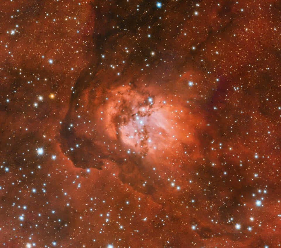 visible orange galaxy, vibrant red nebula, scattered bright stars, SD Desktop Wallpaper