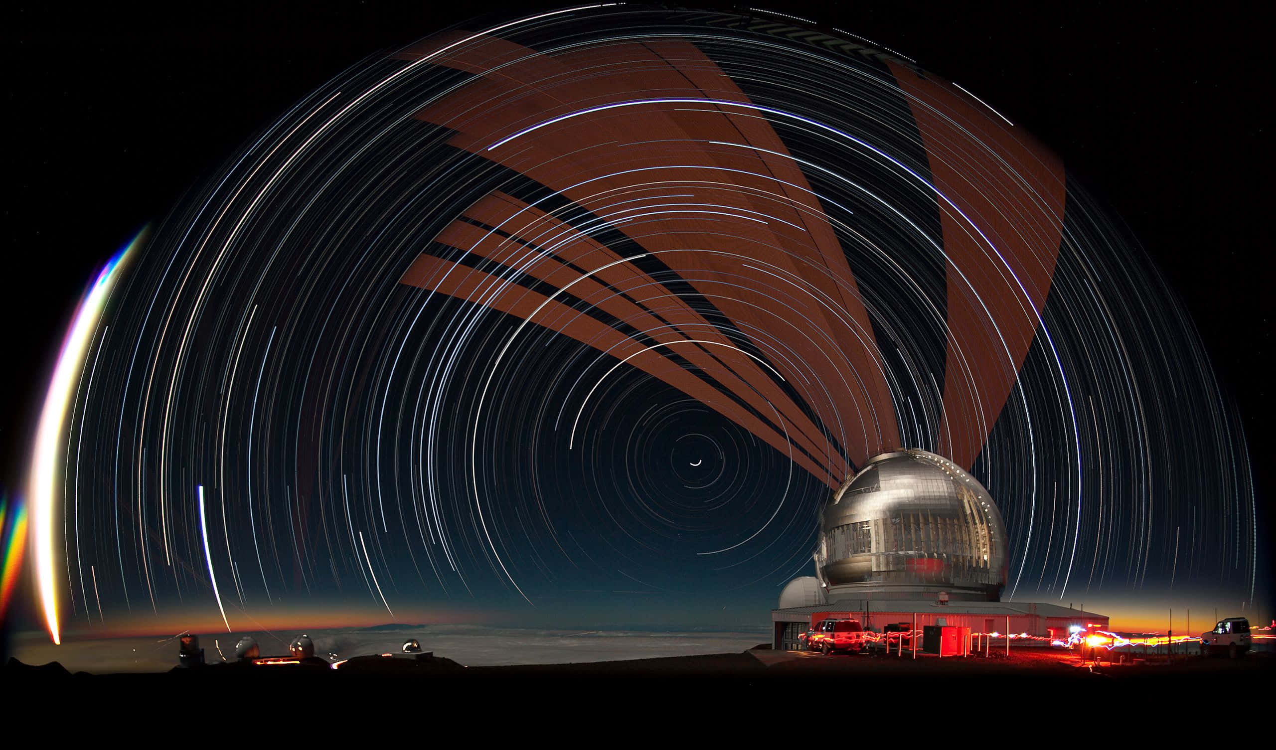 telescope dome, star trails, glowing rainbow arc, 2K Desktop Wallpaper
