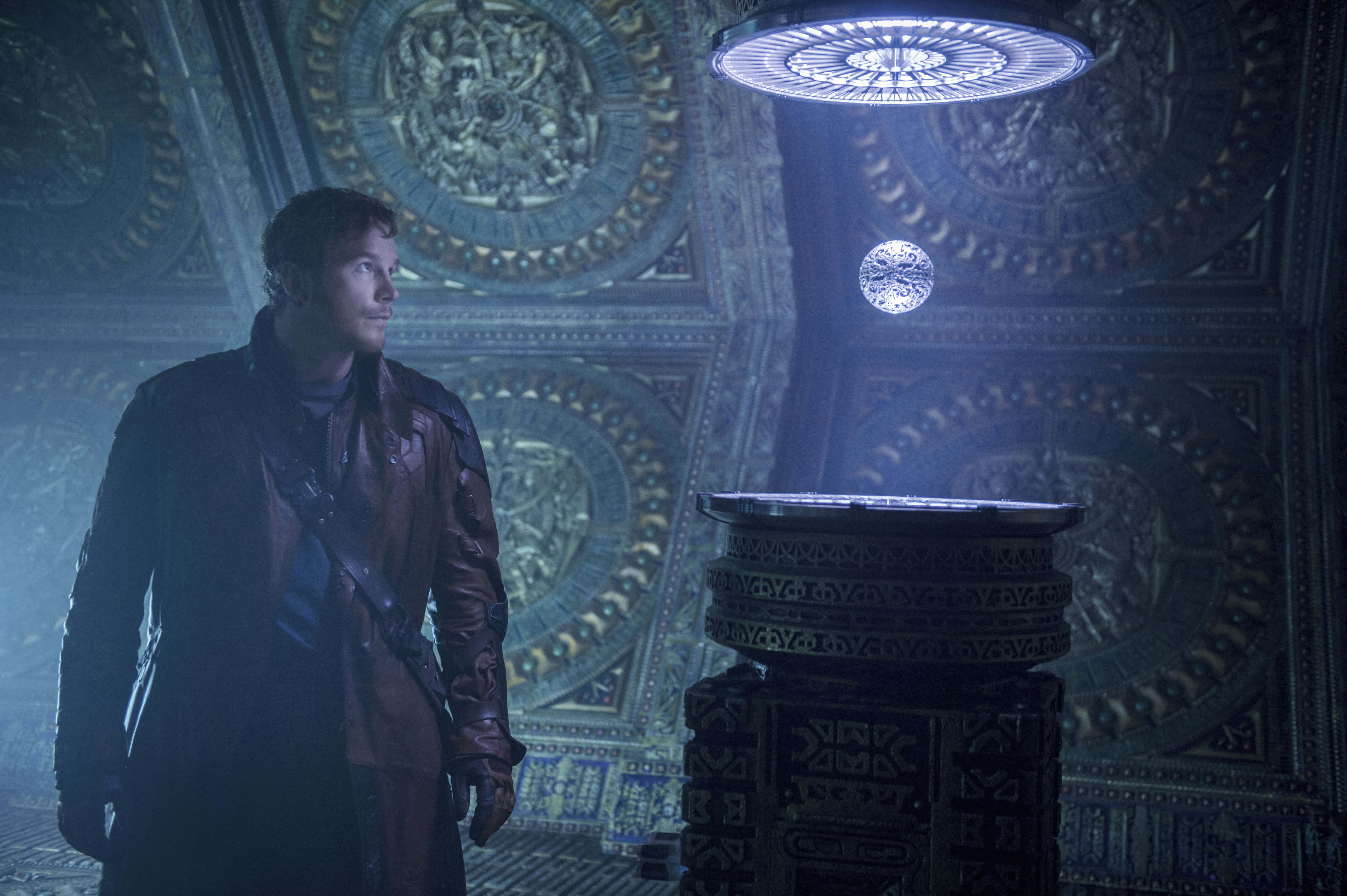 Space Stone, leather jacket, dimly lit ornate chamber, 4K Desktop Wallpaper