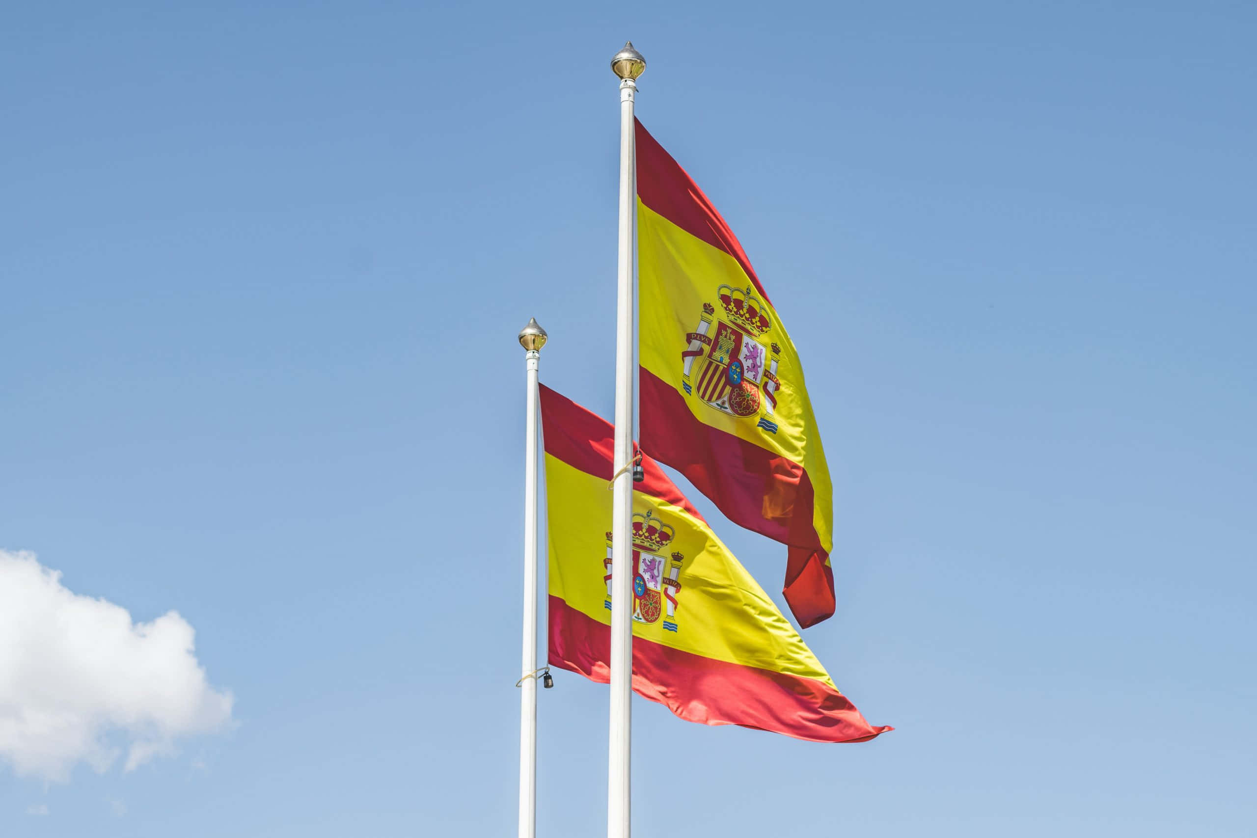Spain flag, clear blue sky, white cloud, 2K Desktop Wallpaper