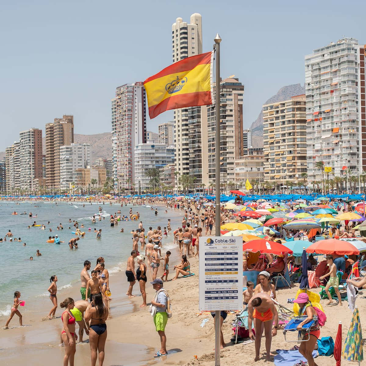 Spanish beach, colorful umbrellas, high-rise hotels, SD Desktop Wallpaper