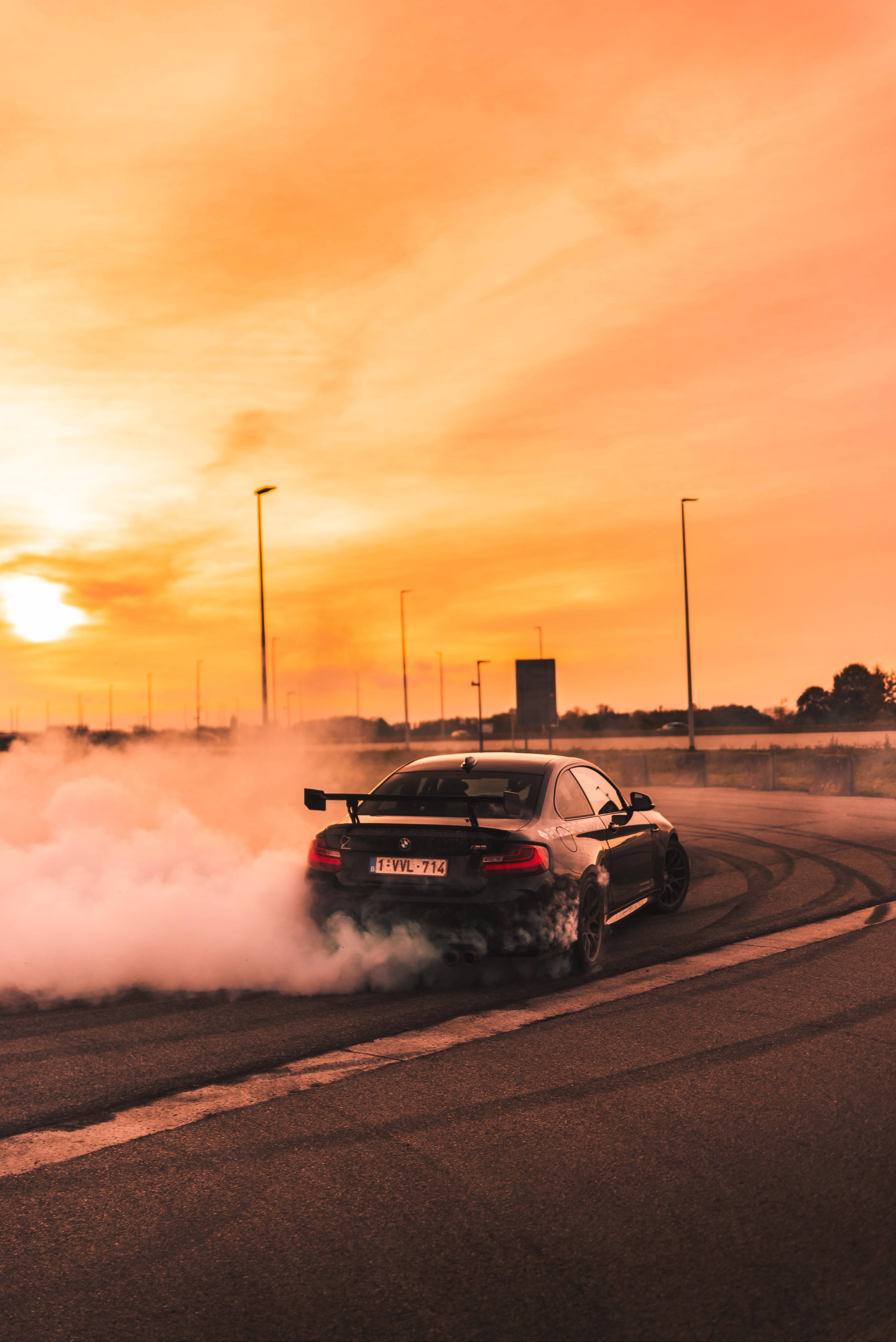 black sports car, cloud of smoke, empty road, 5K Phone Wallpaper