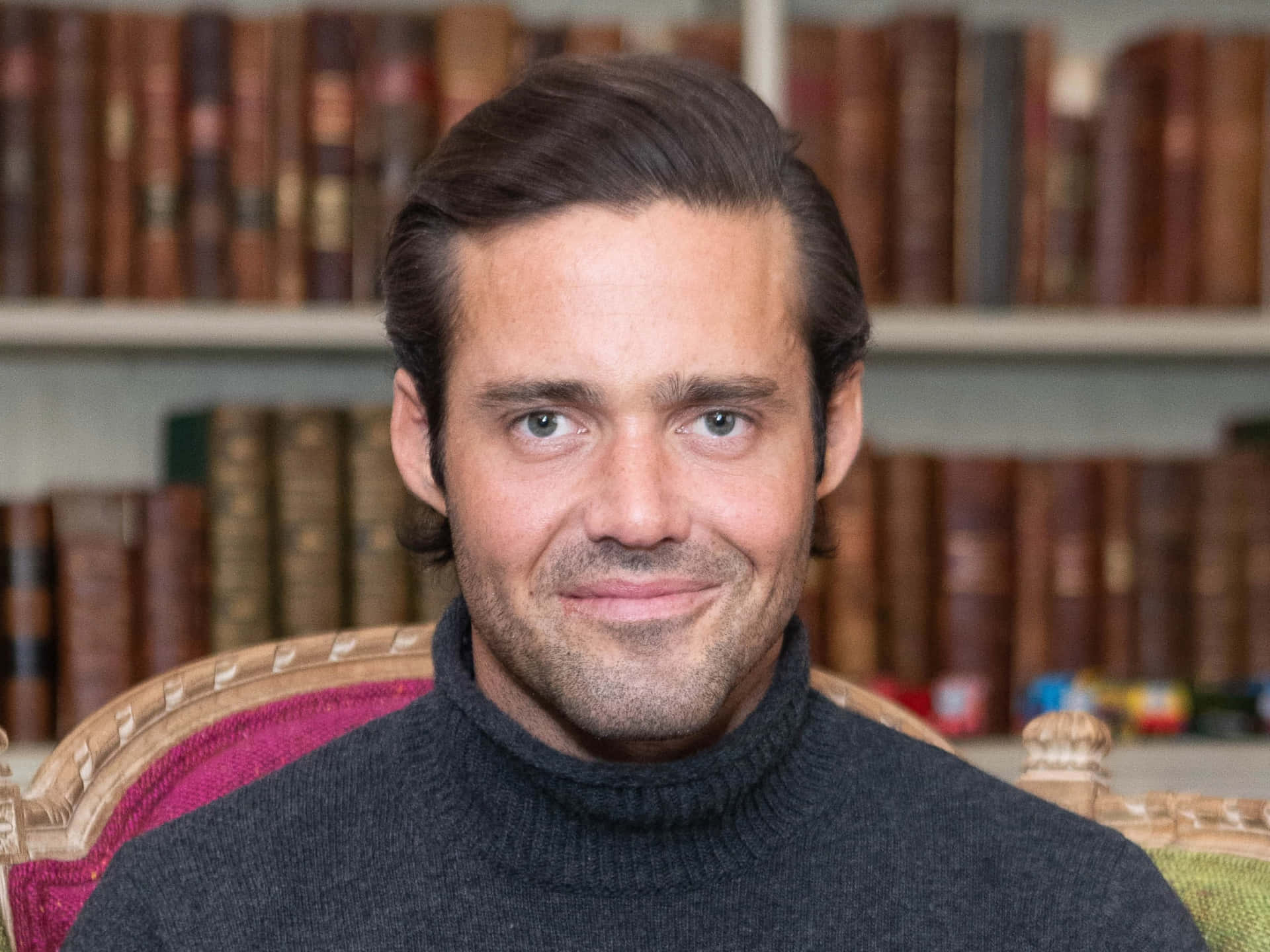Spencer Matthews, plush chair, bookshelf, Full HD Desktop Wallpaper