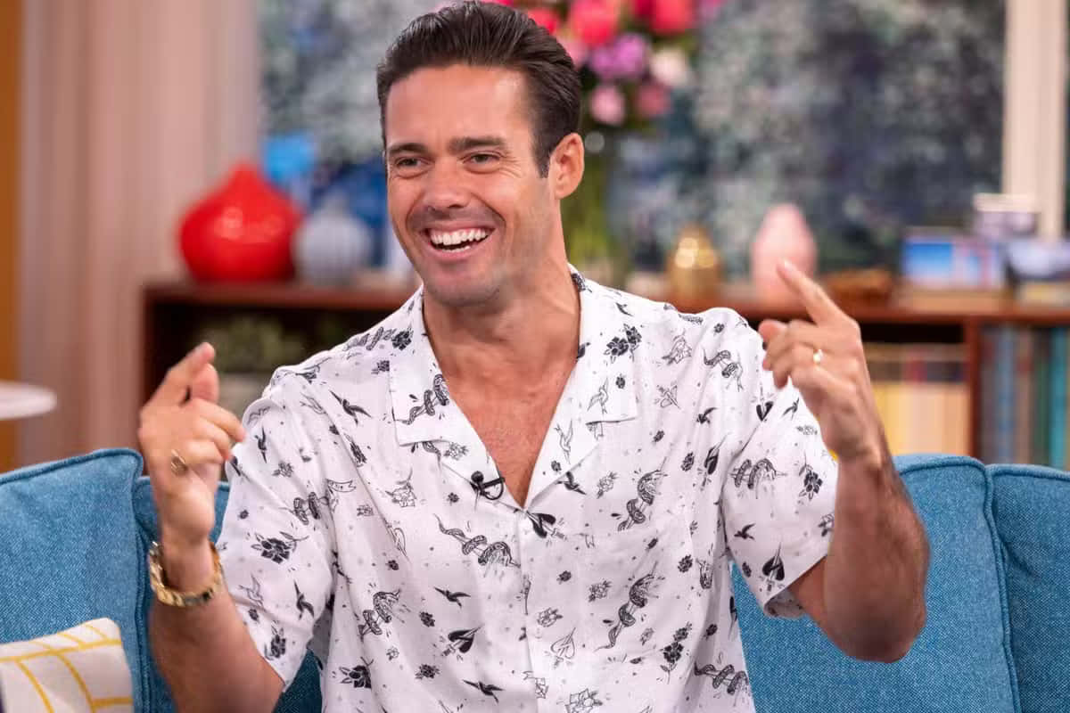 Spencer Matthews, patterned shirt, blue couch, SD Desktop Wallpaper