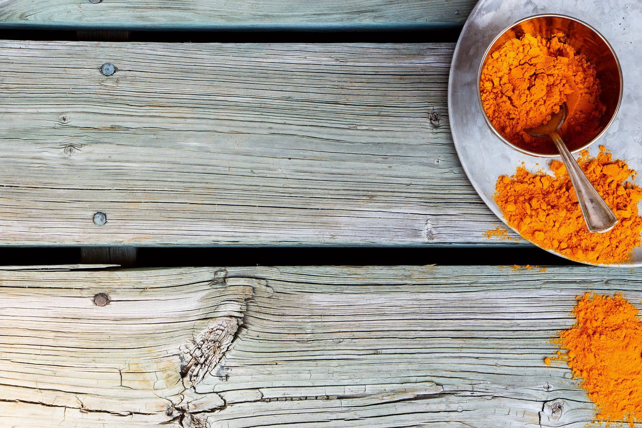 orange turmeric powder, metal bowl, weathered gray wooden planks, Full HD Desktop Wallpaper