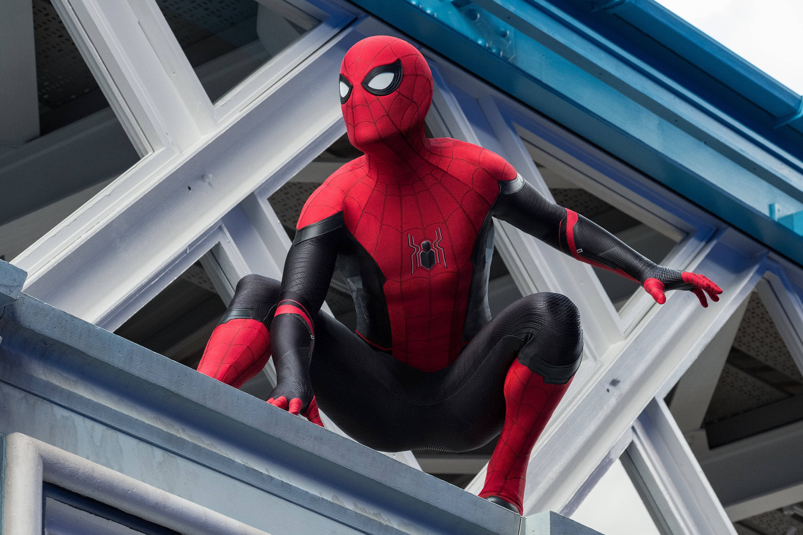 Spider Man Far From Home 2019, red and black suit, modern building ledge, 2K Desktop Wallpaper