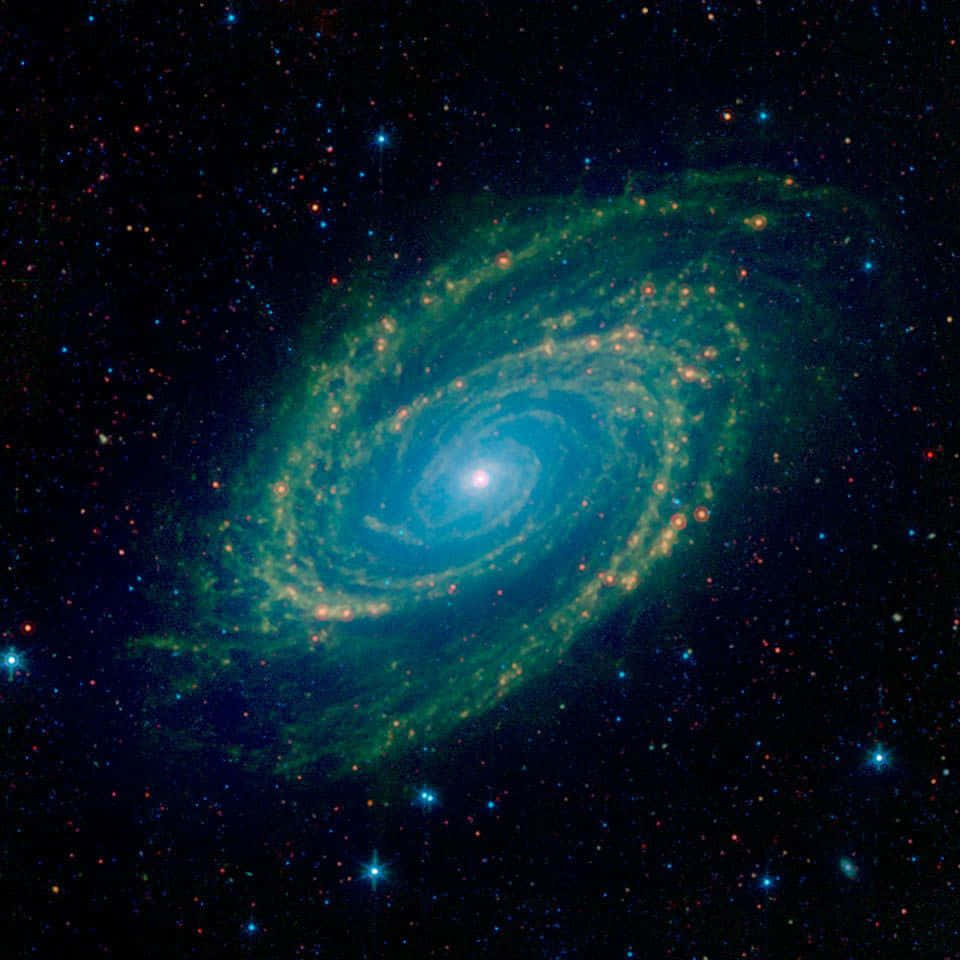 Spiral Galaxy, glowing blue-green arms, orange star clusters, SD Desktop Wallpaper