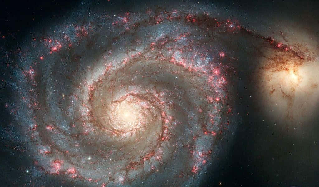 spiral galaxy, glowing pink and blue nebulae, starry cosmic void, SD Desktop Wallpaper