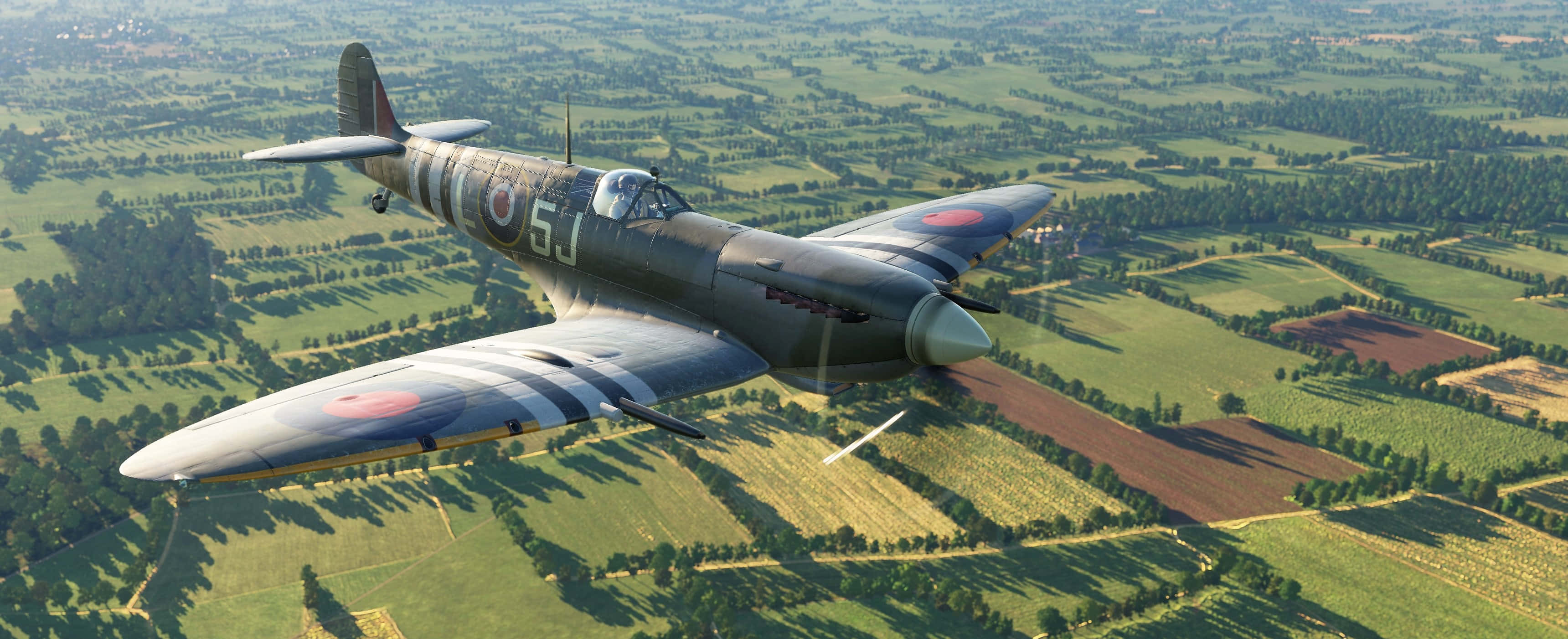 Spitfire, vintage British fighter plane, green fields, 2K Desktop Wallpaper