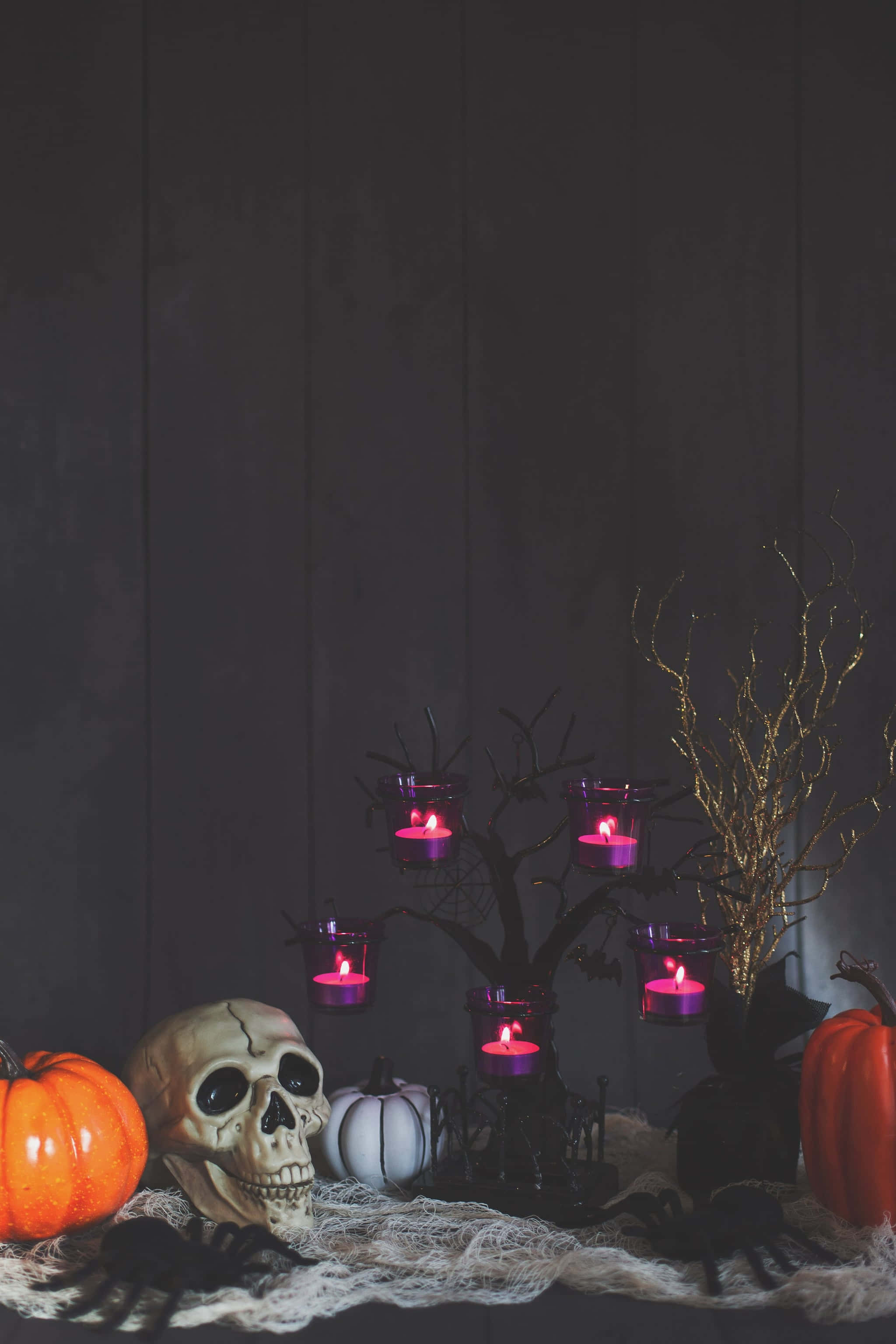 spooky Halloween, skull pumpkins, glowing purple candles, 2K Phone Wallpaper