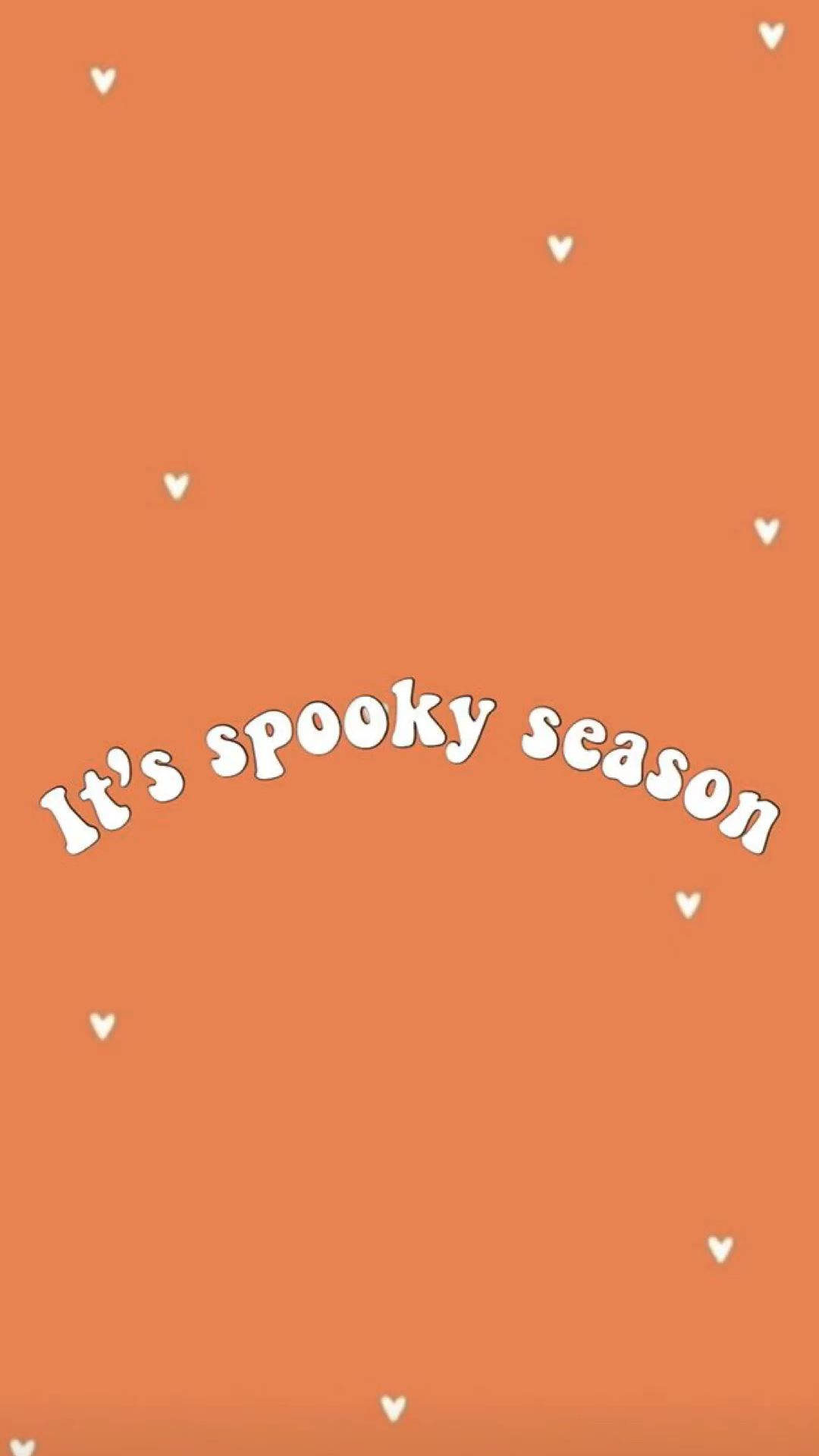 spooky season, warm orange background, scattered white hearts, Full HD Phone Wallpaper