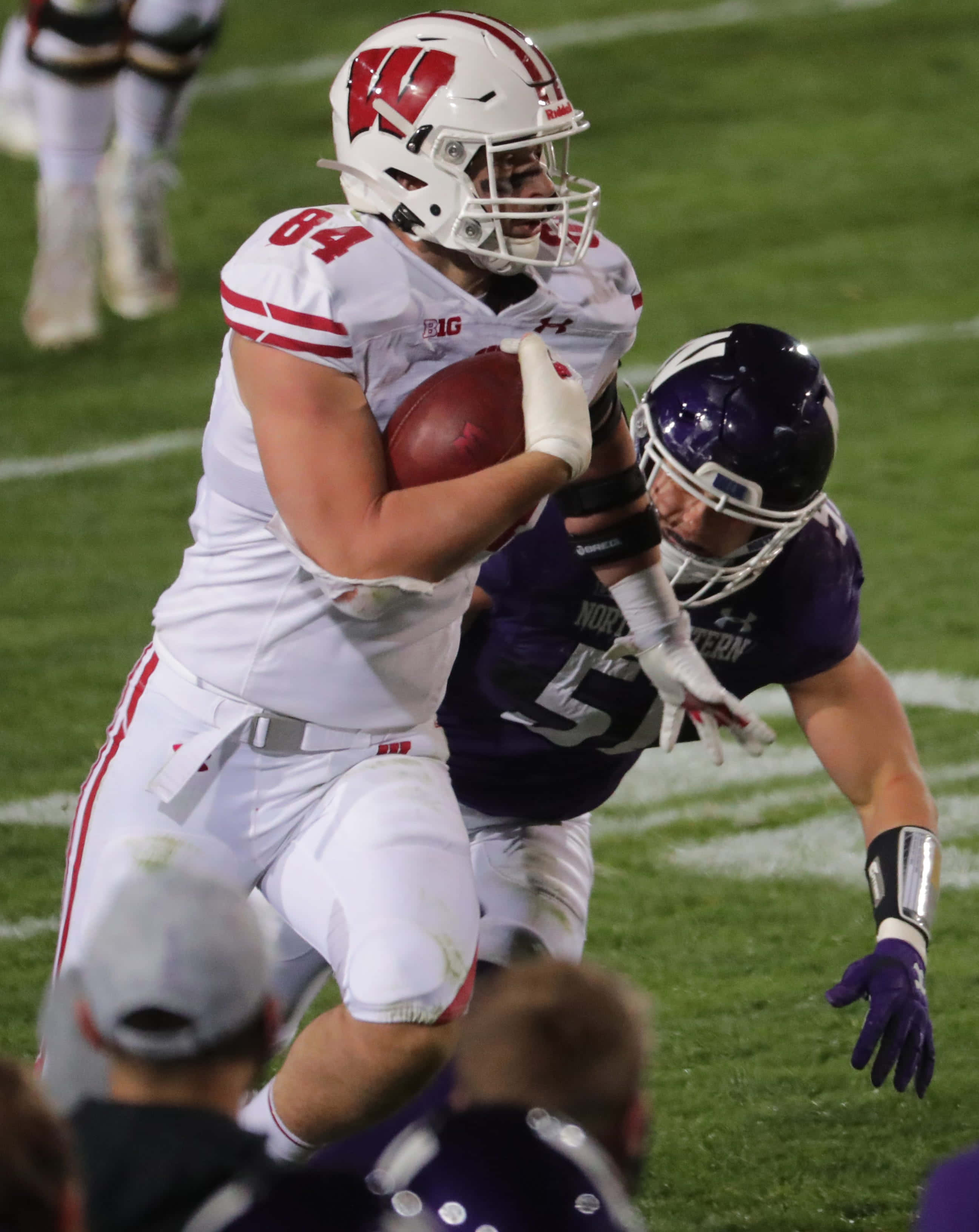Wisconsin football player, white uniform, Northwestern player, 2K Phone Wallpaper