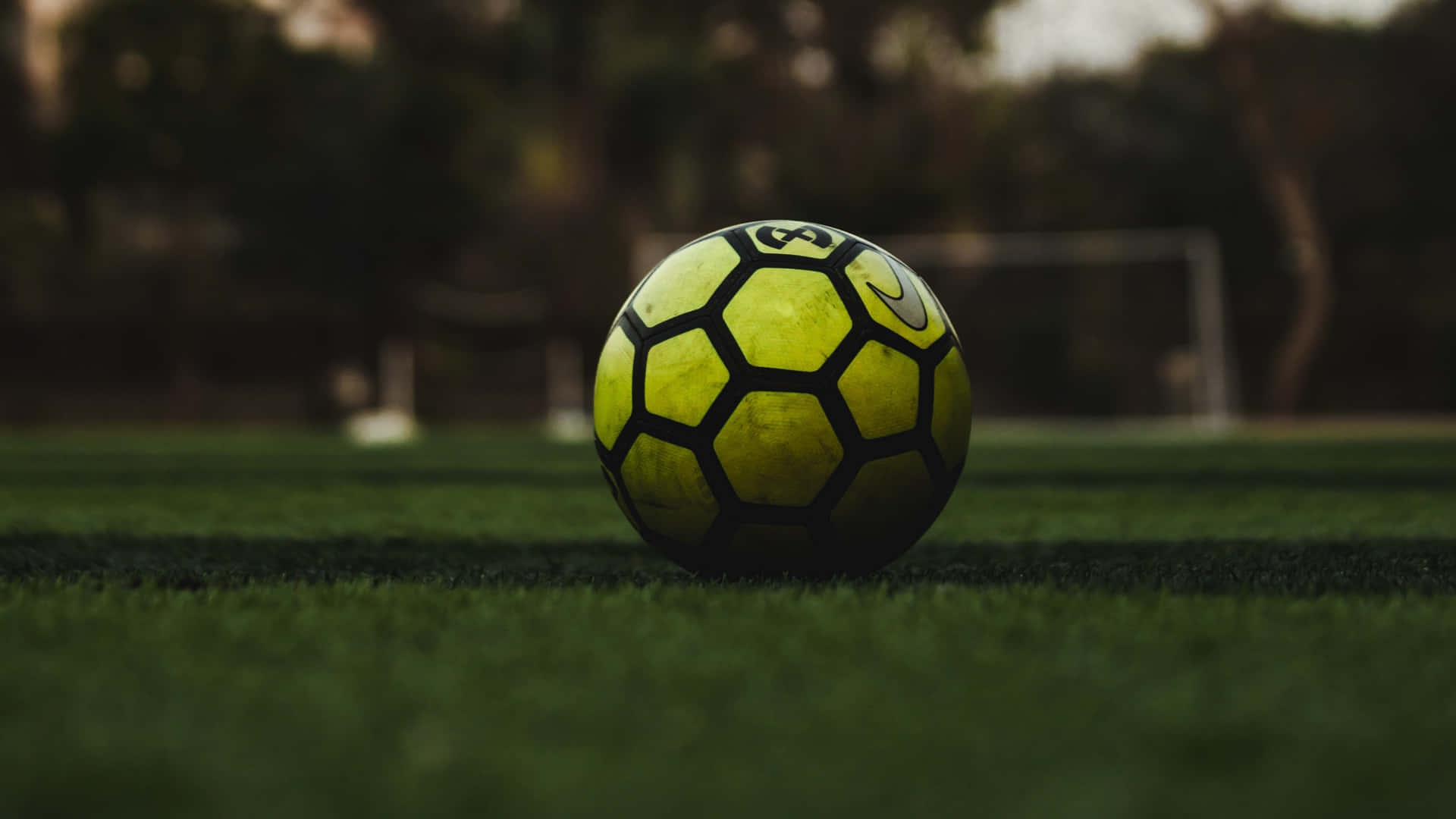 soccer ball, black hexagonal panels, vibrant green grass, Full HD Desktop Wallpaper