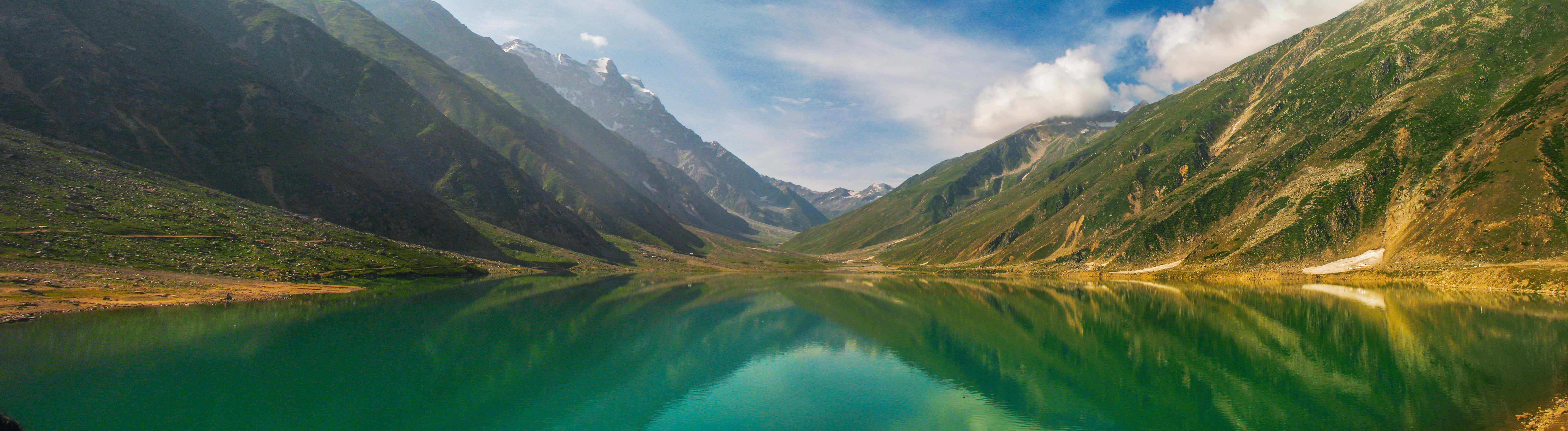 turquoise lake, snow-capped mountains, fluffy clouds, 8K Desktop Wallpaper
